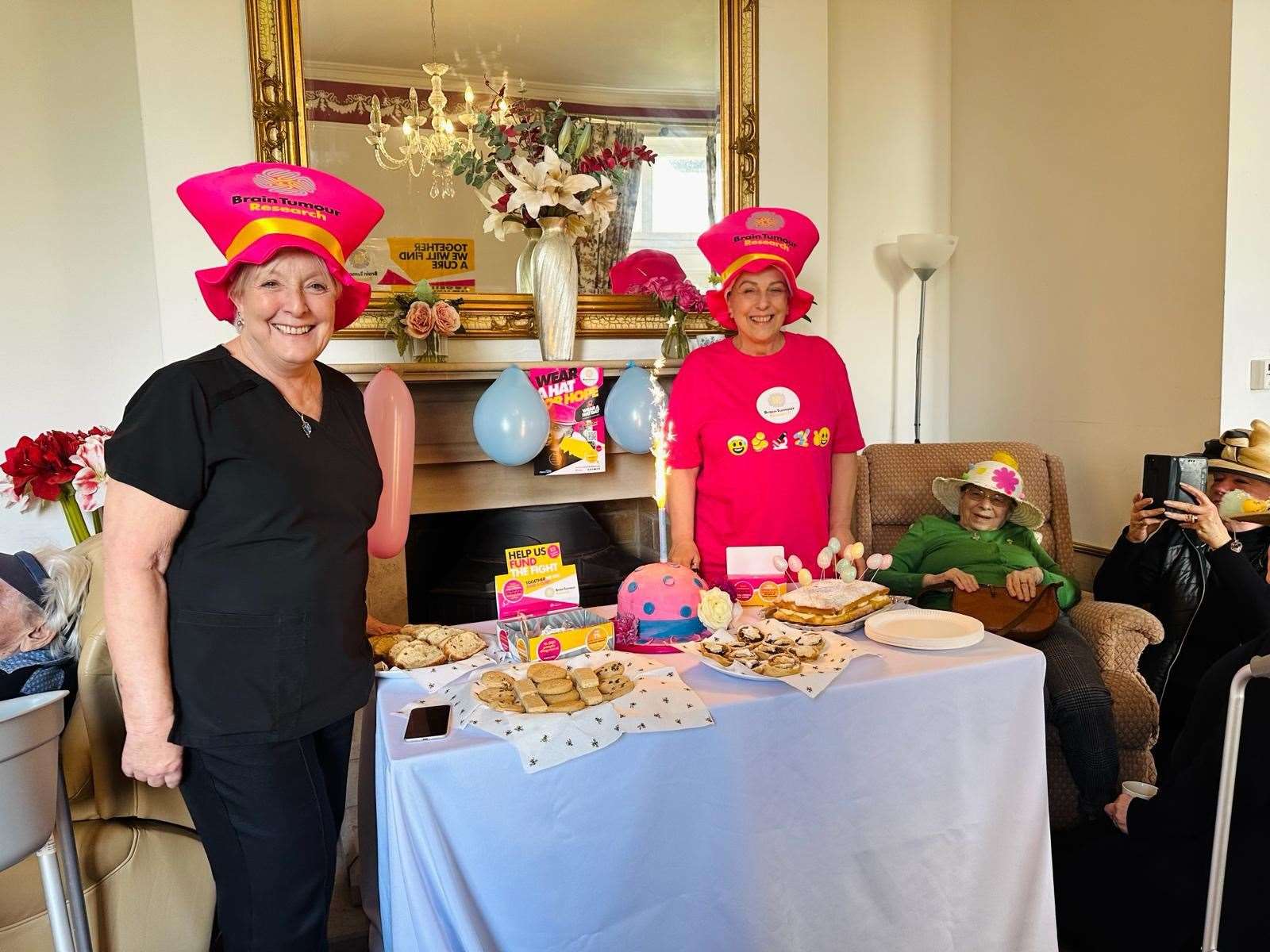 Residents and staff at Enbridge House Care Home in Woolton Hill donned flamboyant hats to raise money for Brain Tumour Research