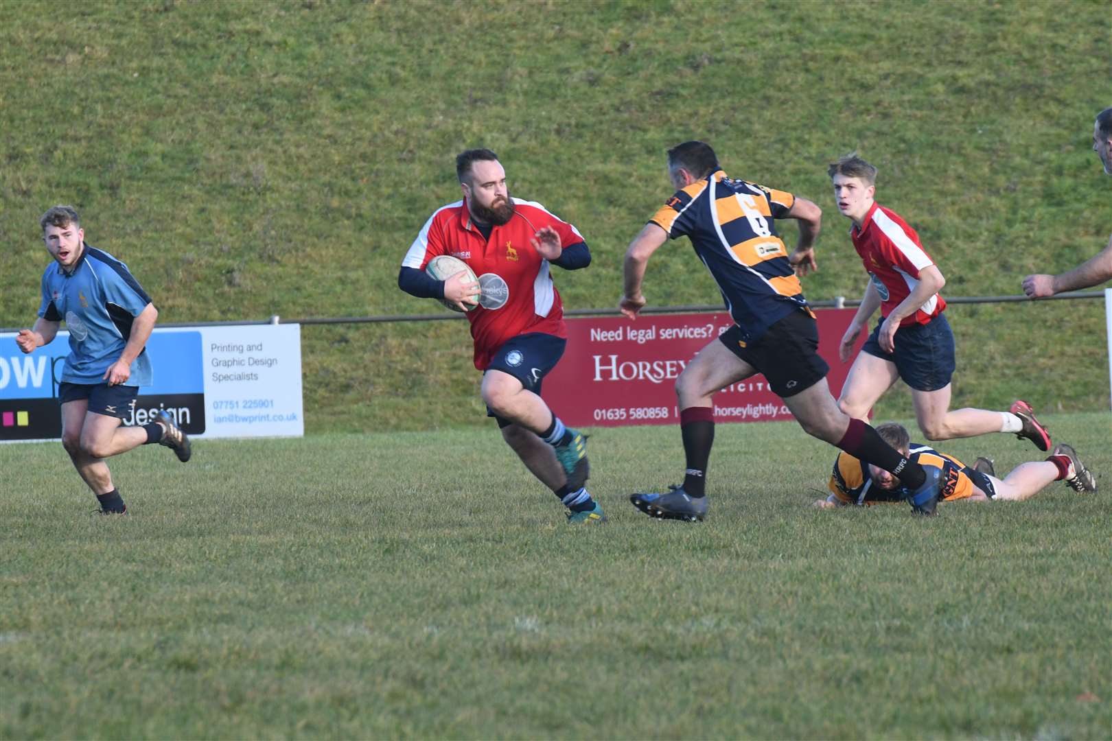 Adam Henderson carries the ball. Pic: Peter Branch