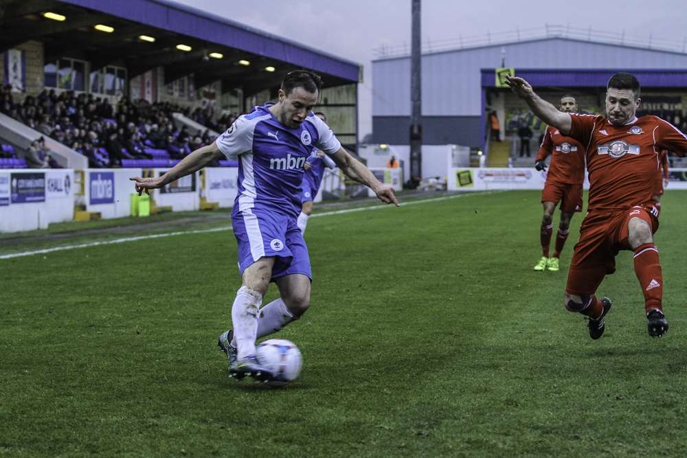 Ian Herring tries to cut out a Chester cross on Saturday Picture: Terry Marland
