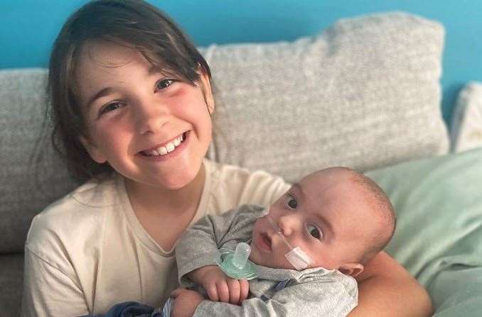 Georgia, 8, with her younger cousin Dylan. Image supplied by Louise Tully