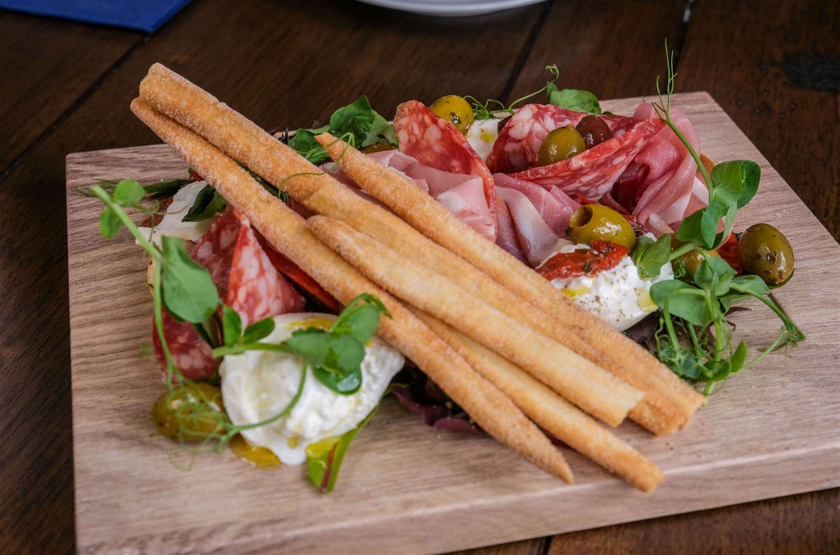 Italian sharing board for two with Italian cured meats, olives, grissini and mozzarella (£14)