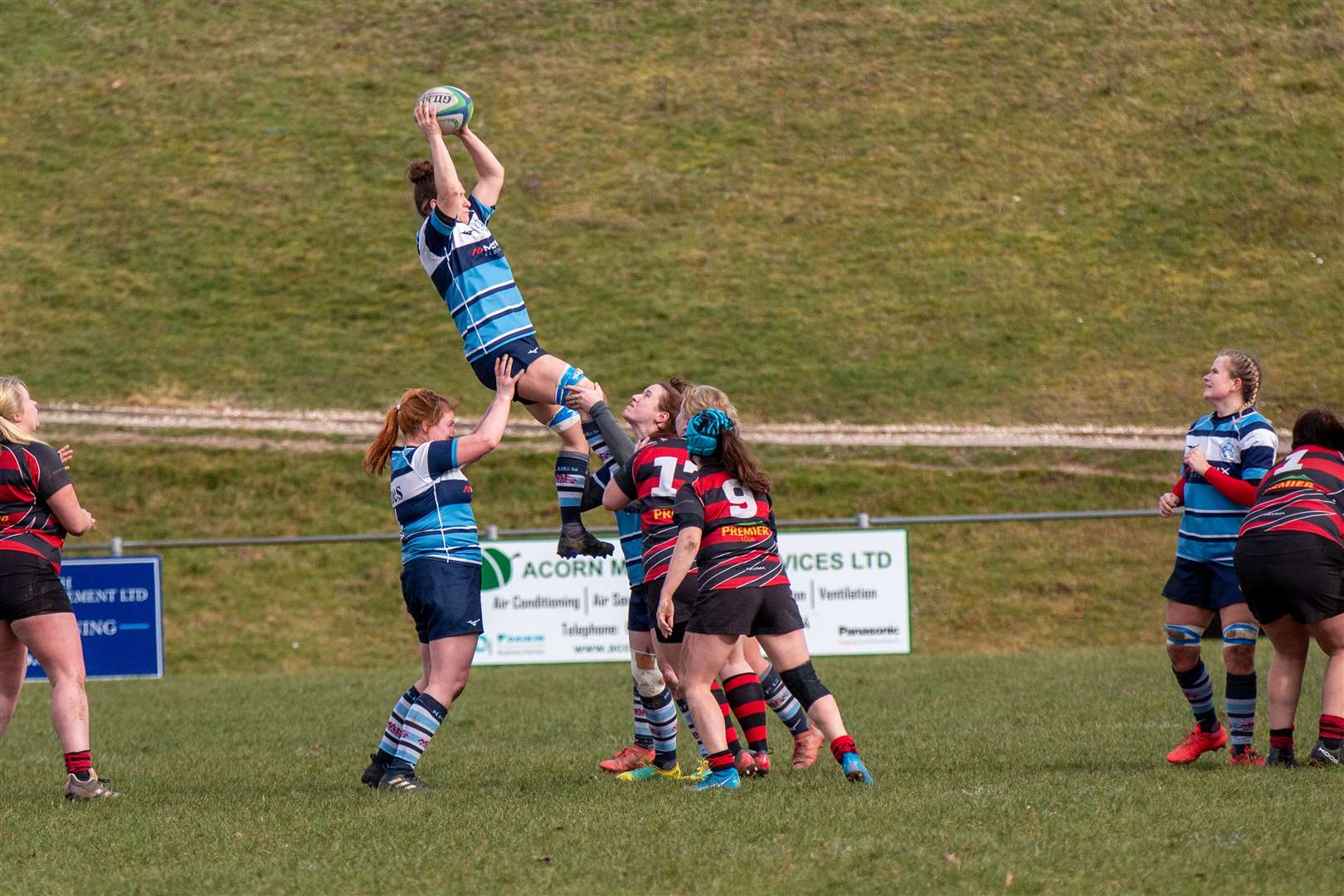 The hosts hold onto a line-out