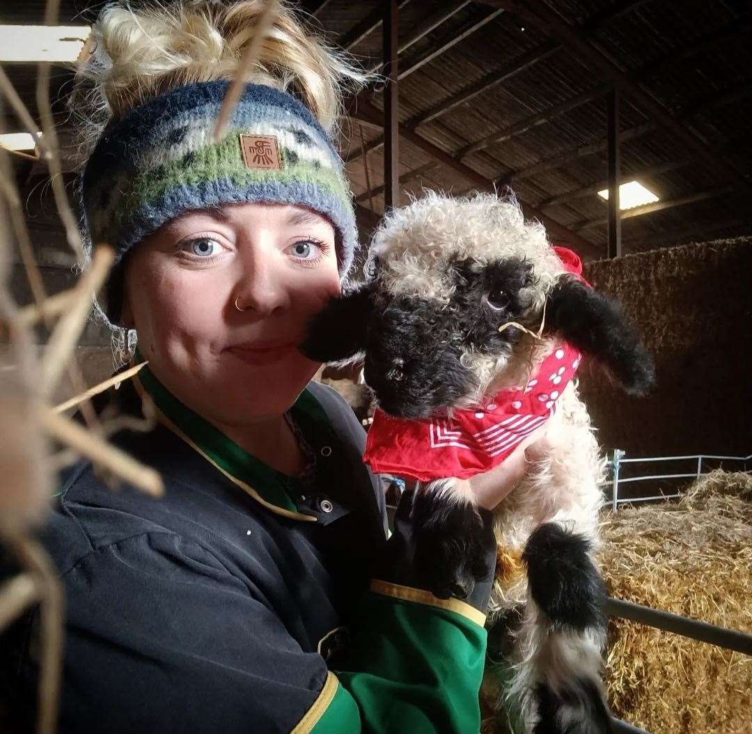 Becky Breakspear with some of the new lambs