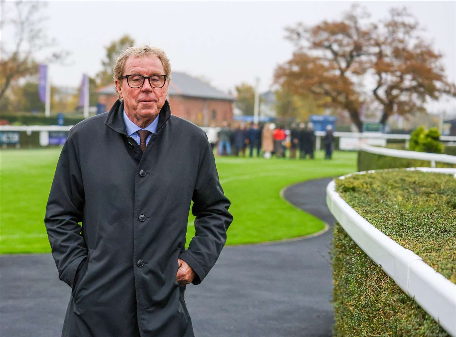 Harry Redknapp leaves Newbury Racecourse after his horse Bowtogreatness wins