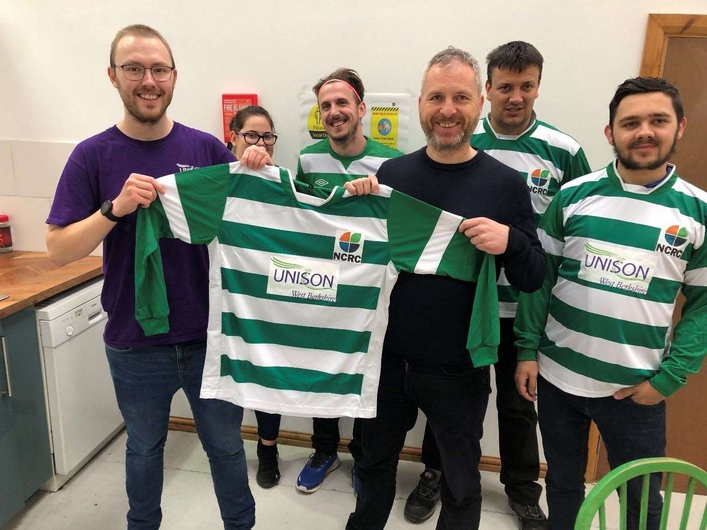 Kit handover from Unison West Berkshire local campaigns organiser Callum to Joe Mckay and members of the team Picture: Unison West Berkshire