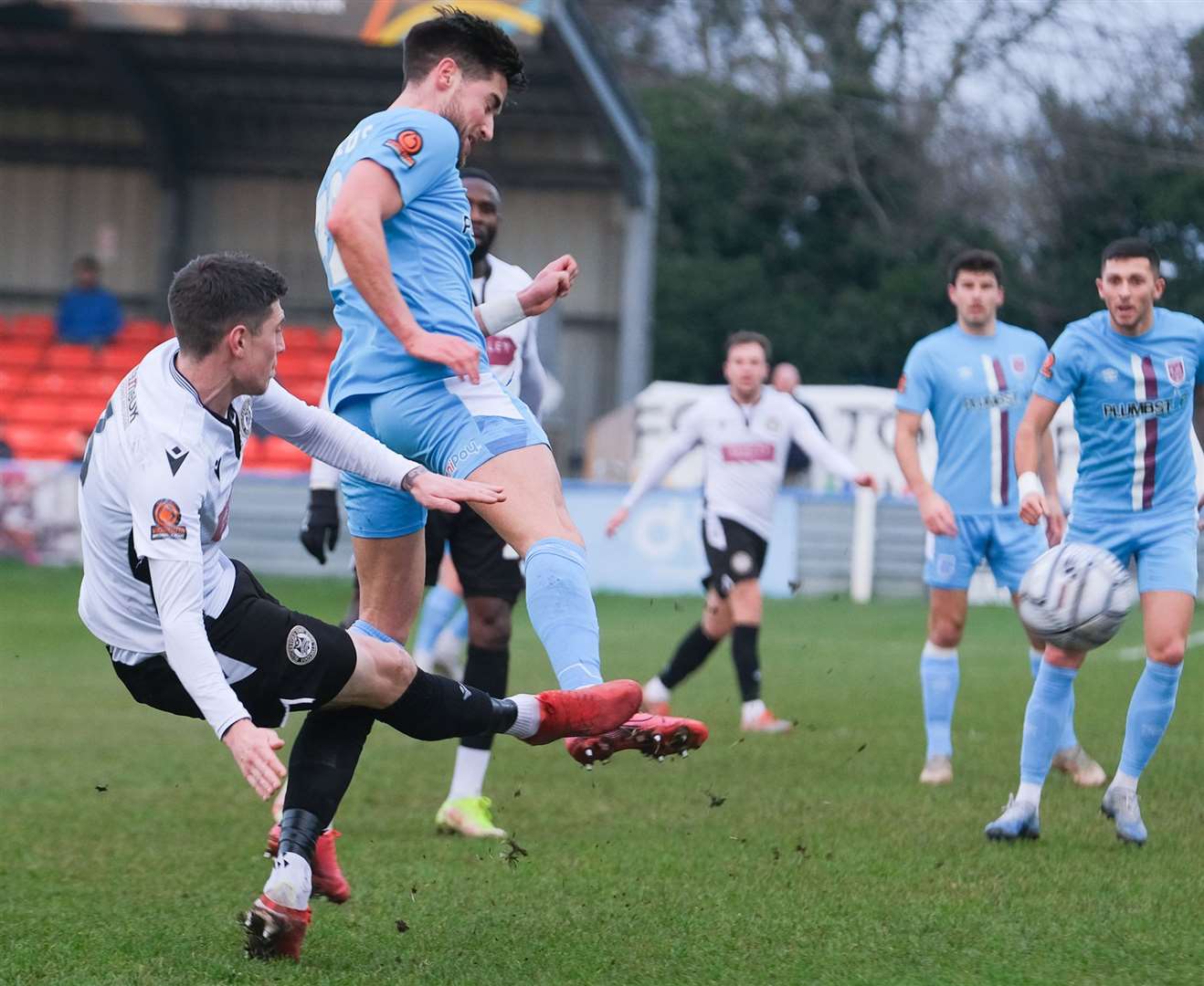 Curtis Angell crosses the ball