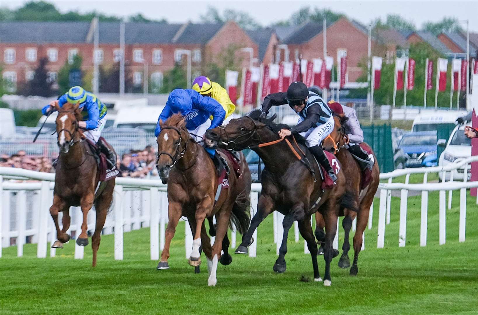 Chindit tries to bite Modern Games as he passes him in the Al Shaqab Lockinge Stakes. Pictures by Phil Cannings