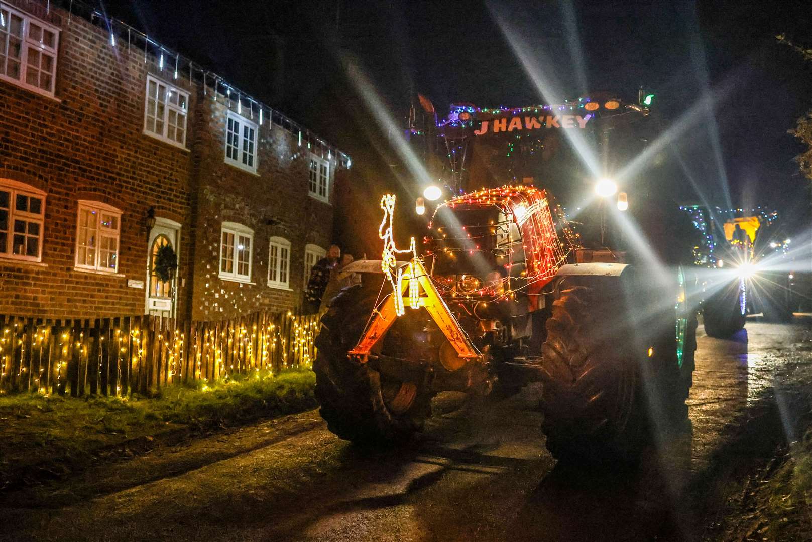Woolton Hill Christmas Tractor Run coming along Tubbs Lane in Highclere