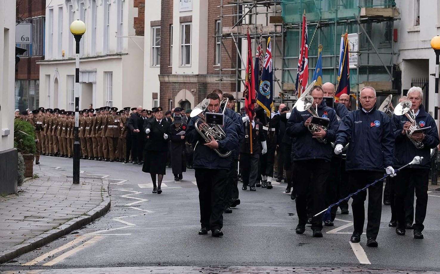 Remembrance Parade heading for the Clock House