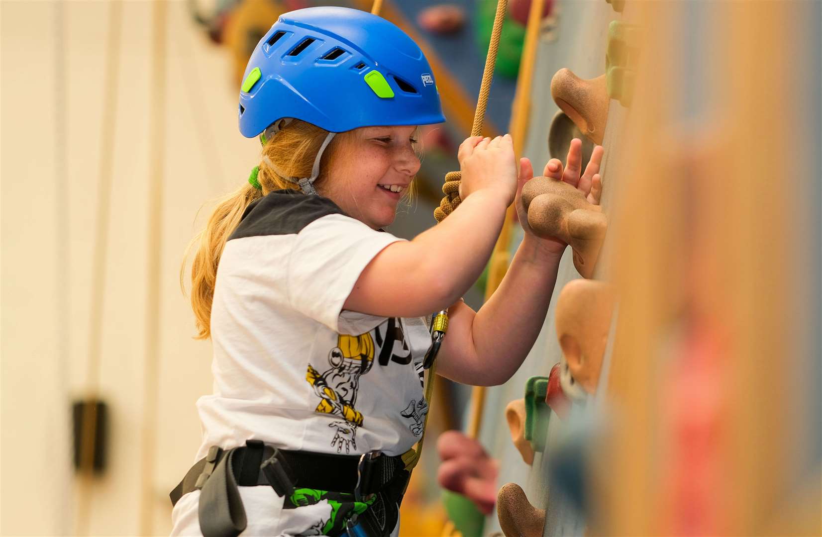 Swings & Smiles using the climbing wall