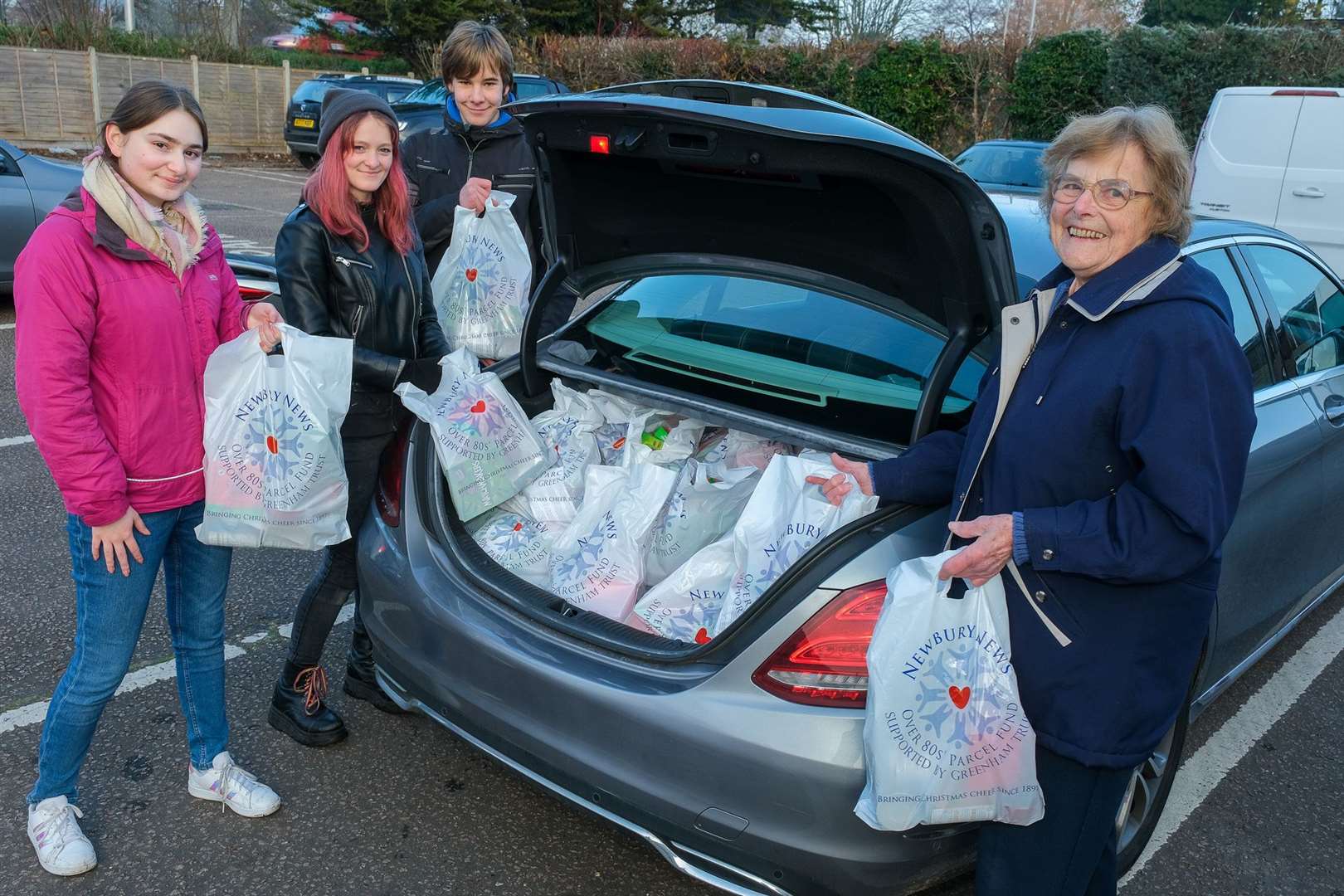 St Bart's students with Valerie Vyrom Taylor who helped deliver the parcels in Chieveley