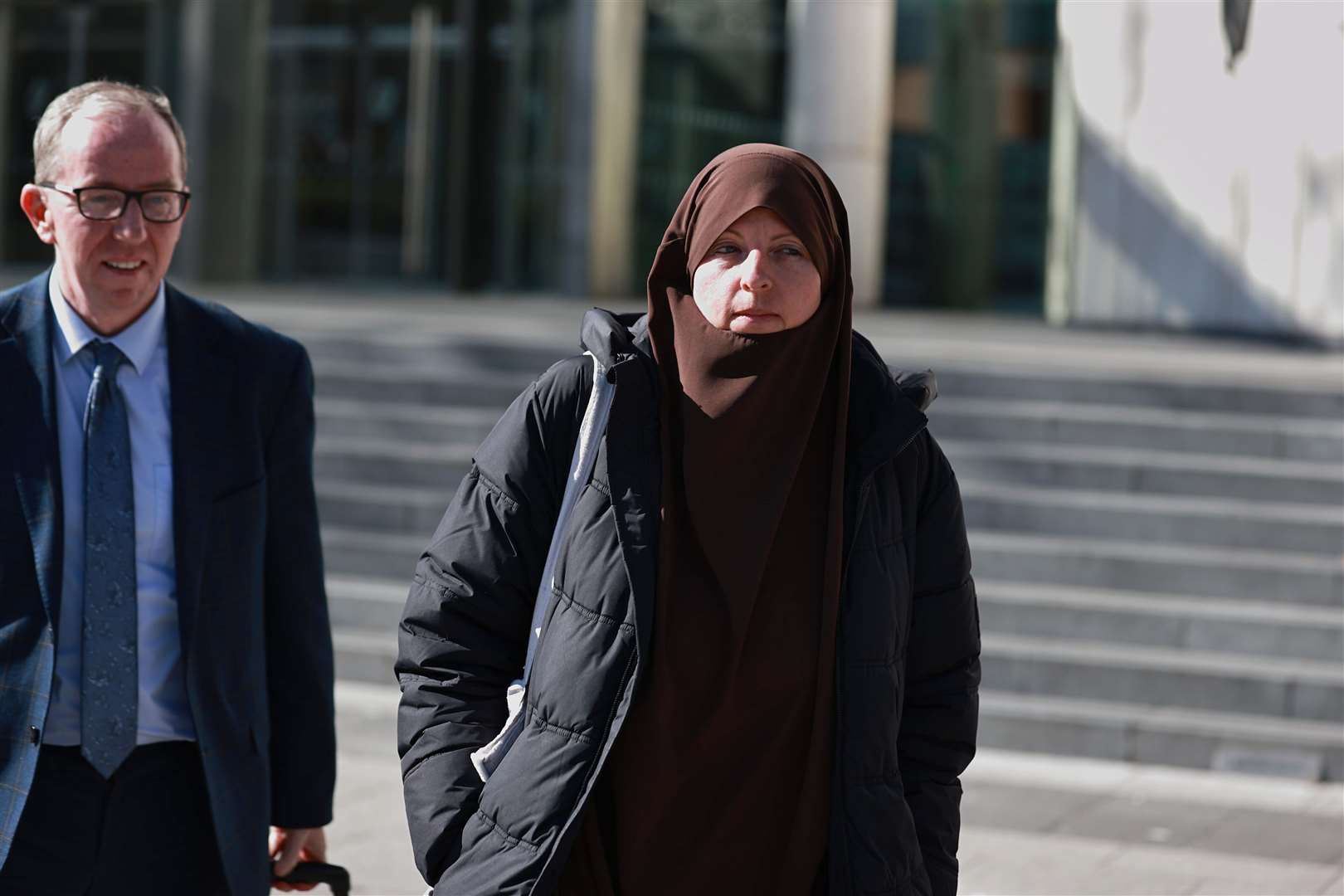 Lisa Smith with her legal representative, Peter Corrigan of Phoenix Law, at the Courts of Criminal Justice, Dublin (Liam McBurney/PA)