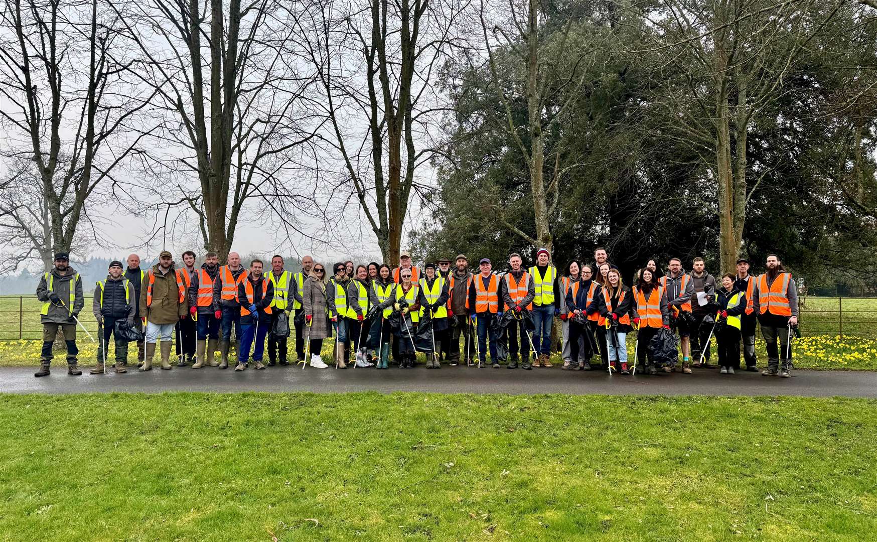 The team at Wasing pose during their annual Litter Pick. Credit: @Wasing1759