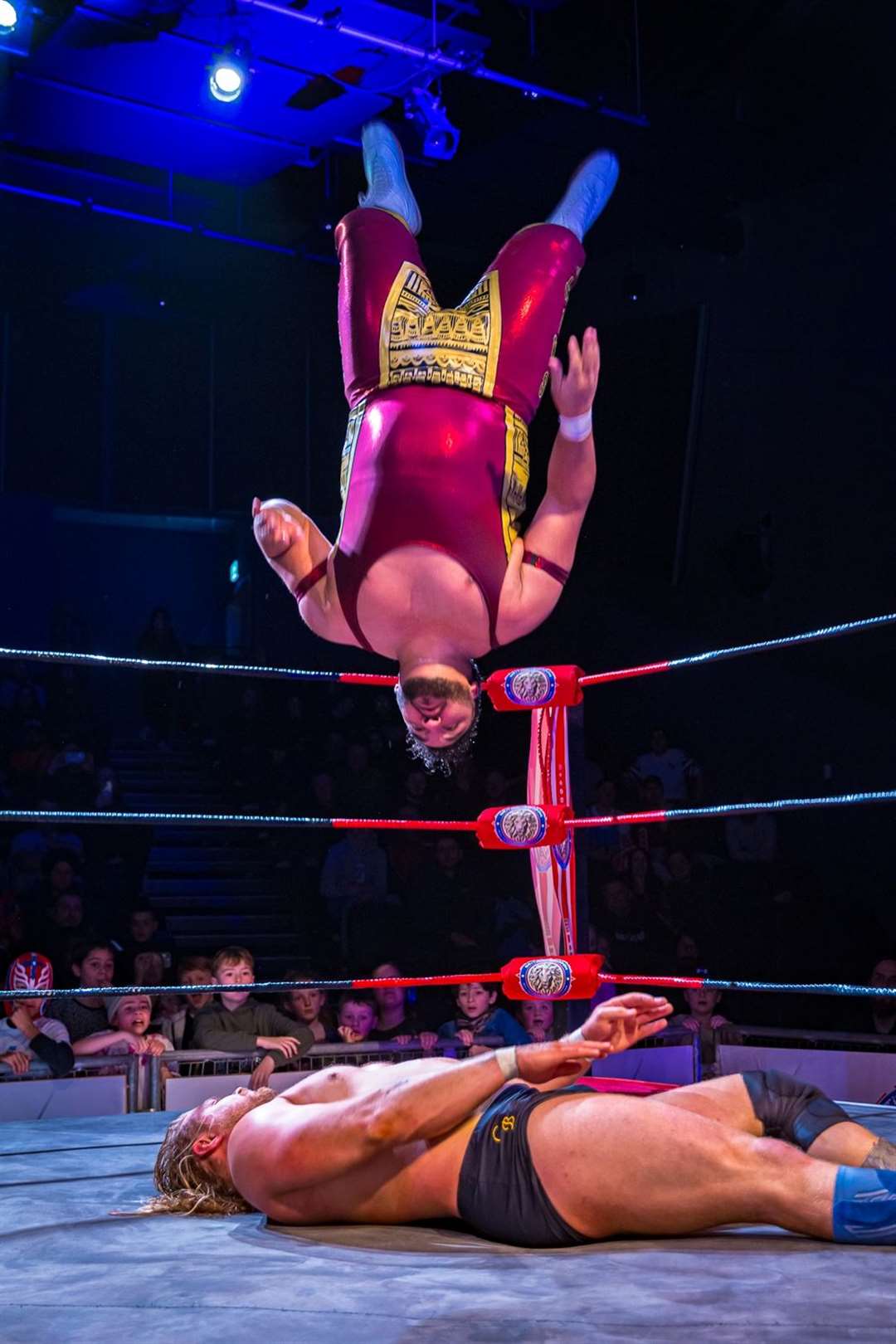Saime Sahin moonsaults onto Chris Bronson at a British Kingdom Pro Wrestling event in Thatcham - Photo: Emma Meek