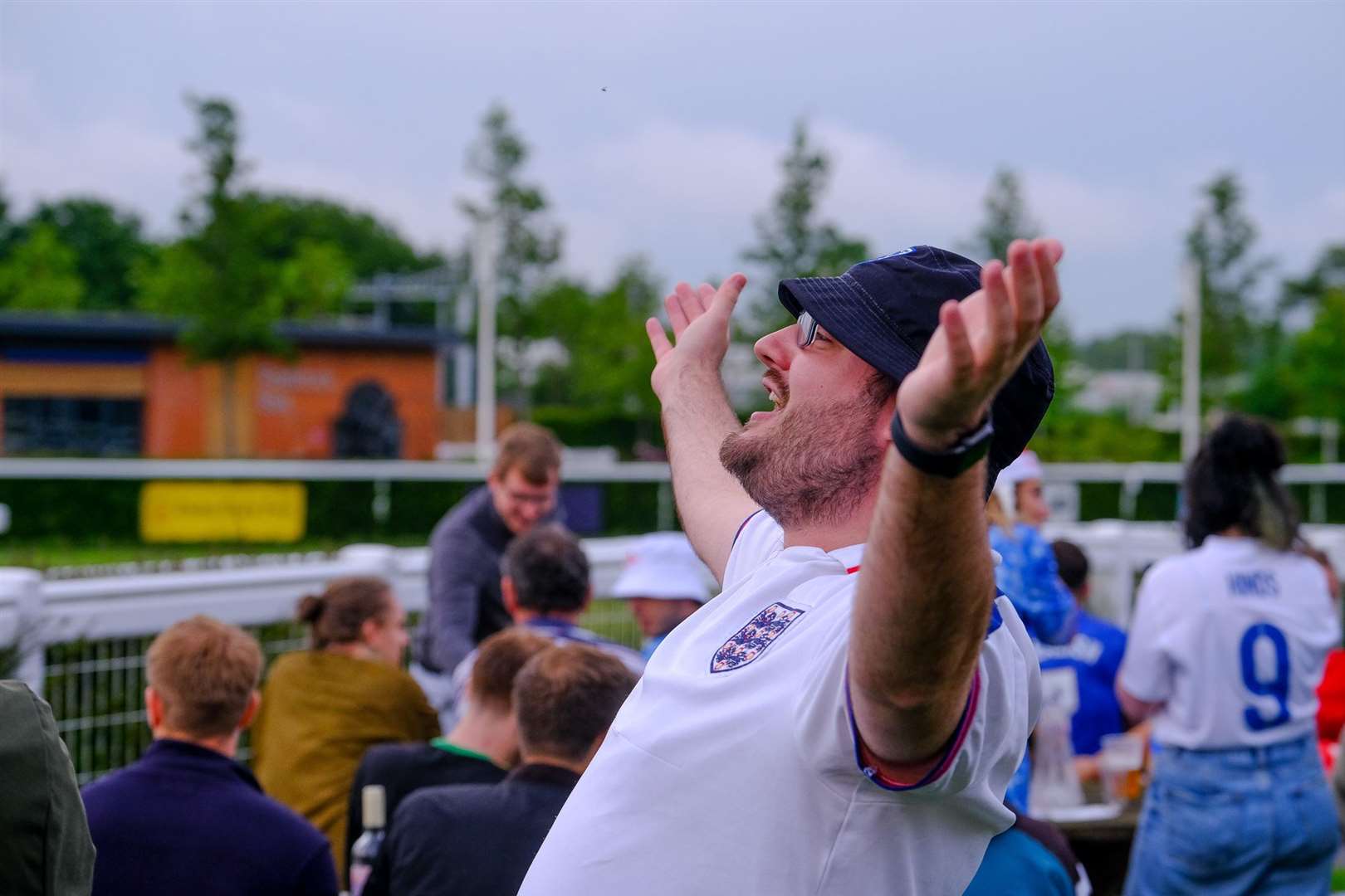 England fans watch the game at Newbury Racecourse.Ref: 28-0921.. (49112213)
