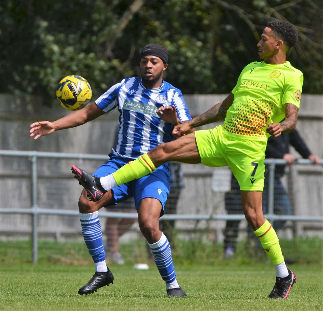 Michael Fernandes brings the ball down ahead of Levi Heholt