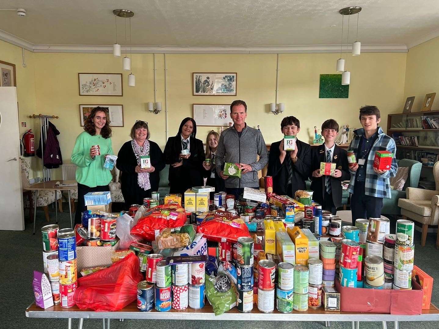 Students from St Bartholomew's School in Newbury visited Fair Close to donate goods collected in its Harvest Appeal