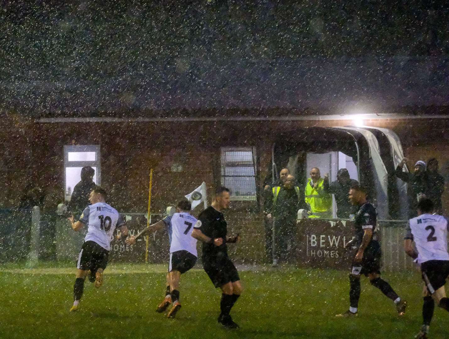 Jake Evans celebrates his weekend winner in the lashing rain