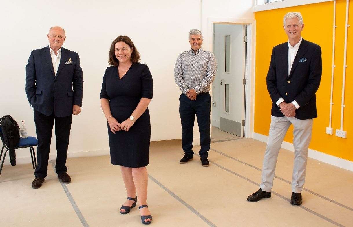 Berkshire Youth president Roger Smee, West Berkshire Council leader Lynne Doherty, Berkshire Youth CEO David Seward and West Berkshire Council executive member for children and young people, Dominic Boeck viewing the work at the Waterside Centre