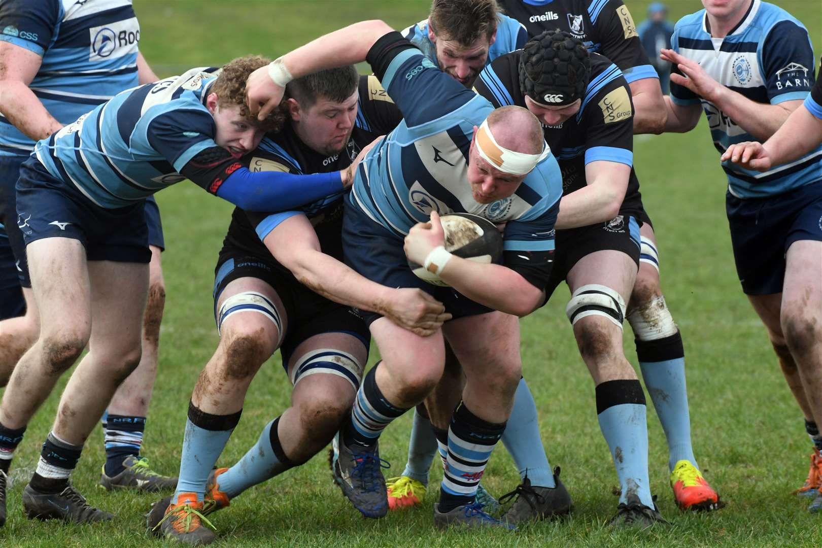 Prop James Macaulay is brought down. Picture: Peter Branch
