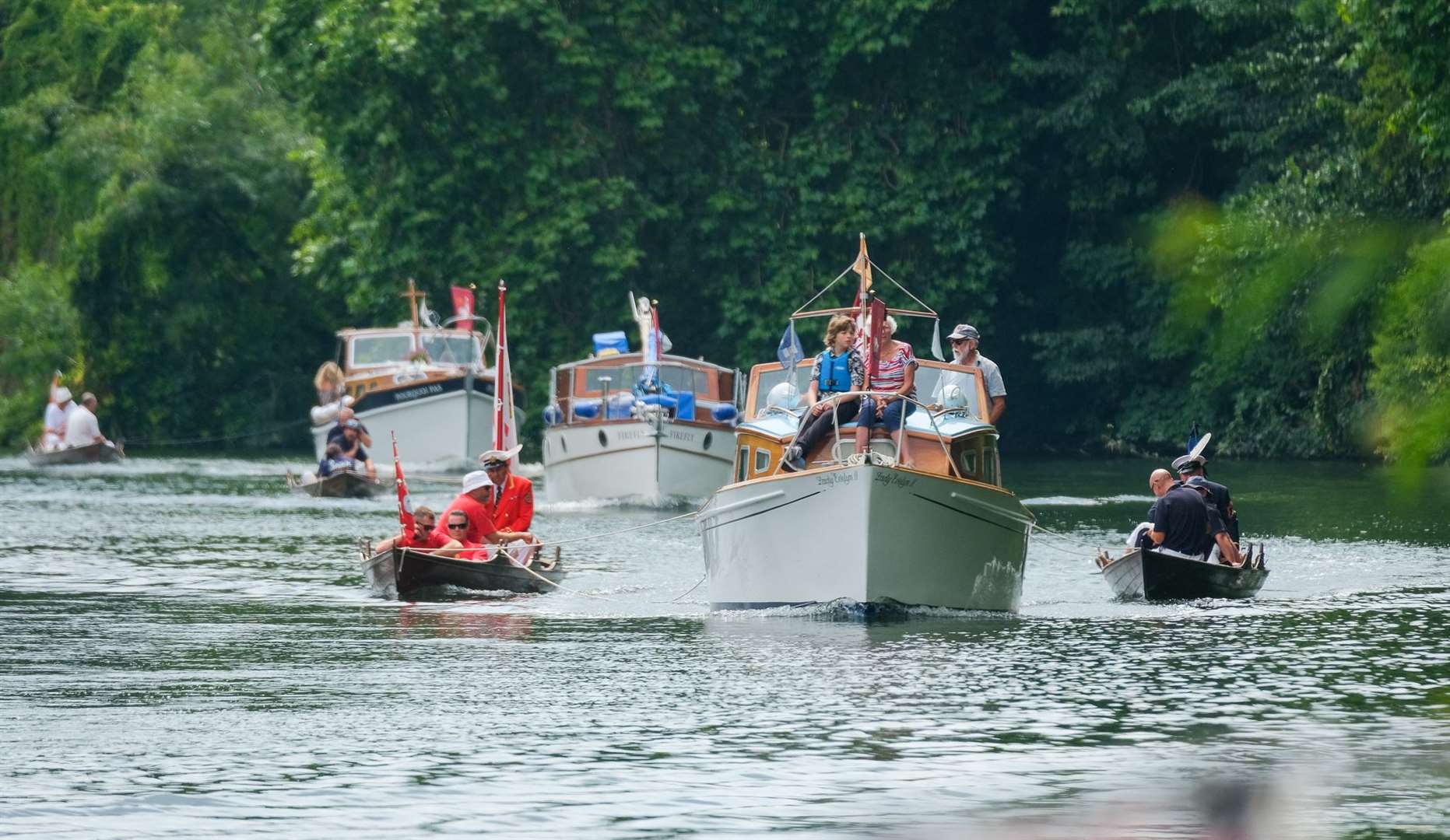 The flotilla comes up the river