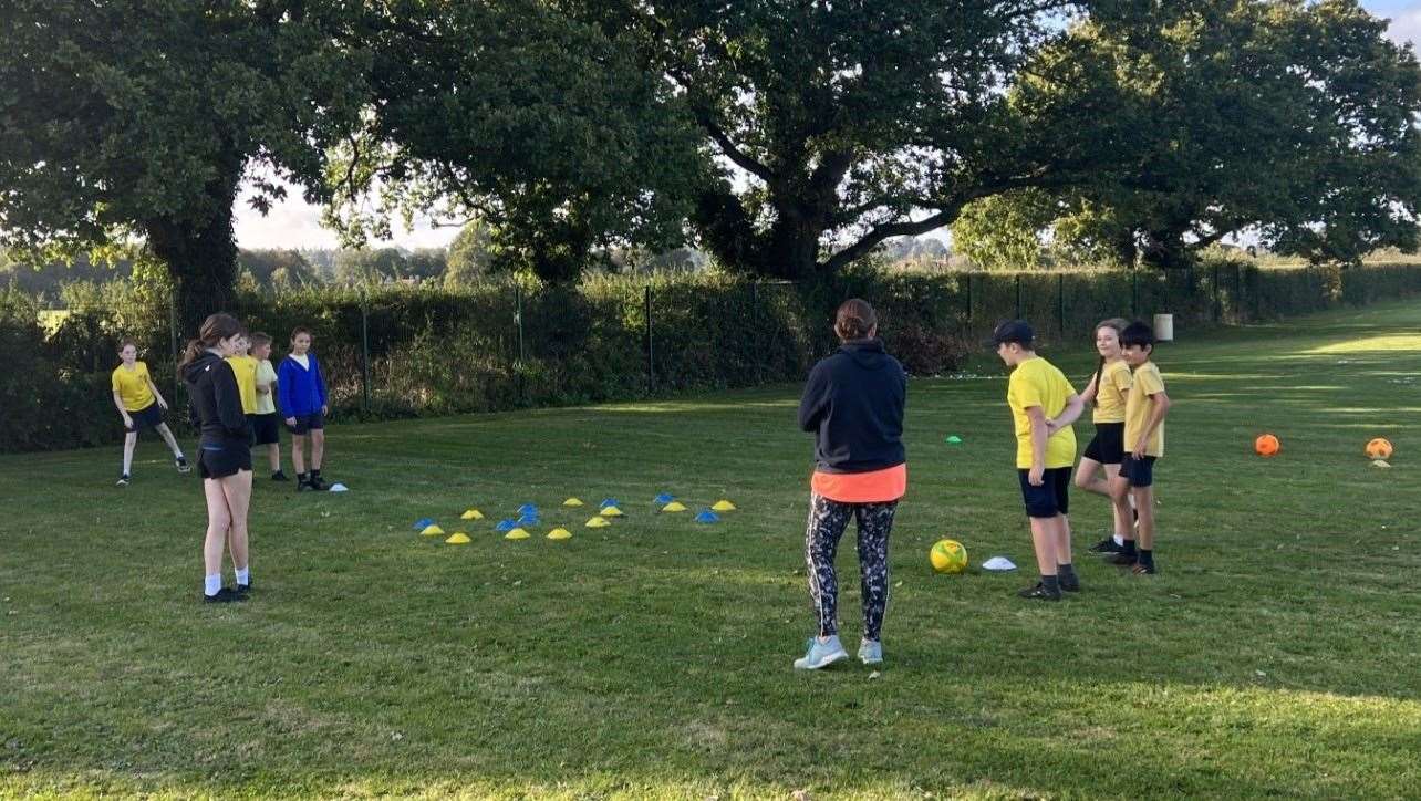 Pupils enjoying a kick about at Theale Green's sports festival