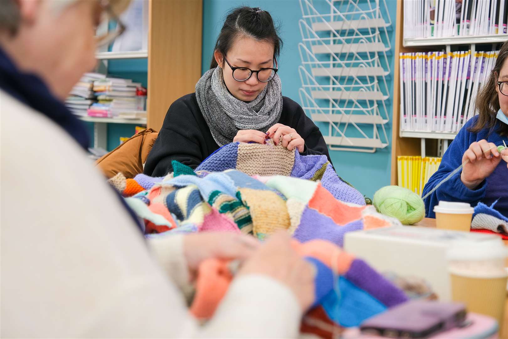 Busy knitters making blankets for charity