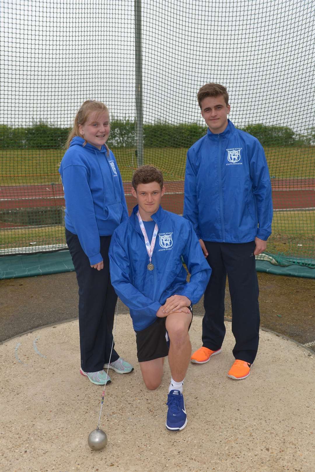 Charlotte Payne, Jamie Kuehnel and Oliver Hewitt who all competed in the hammer at the National Schools Athletics Championships in Gateshead