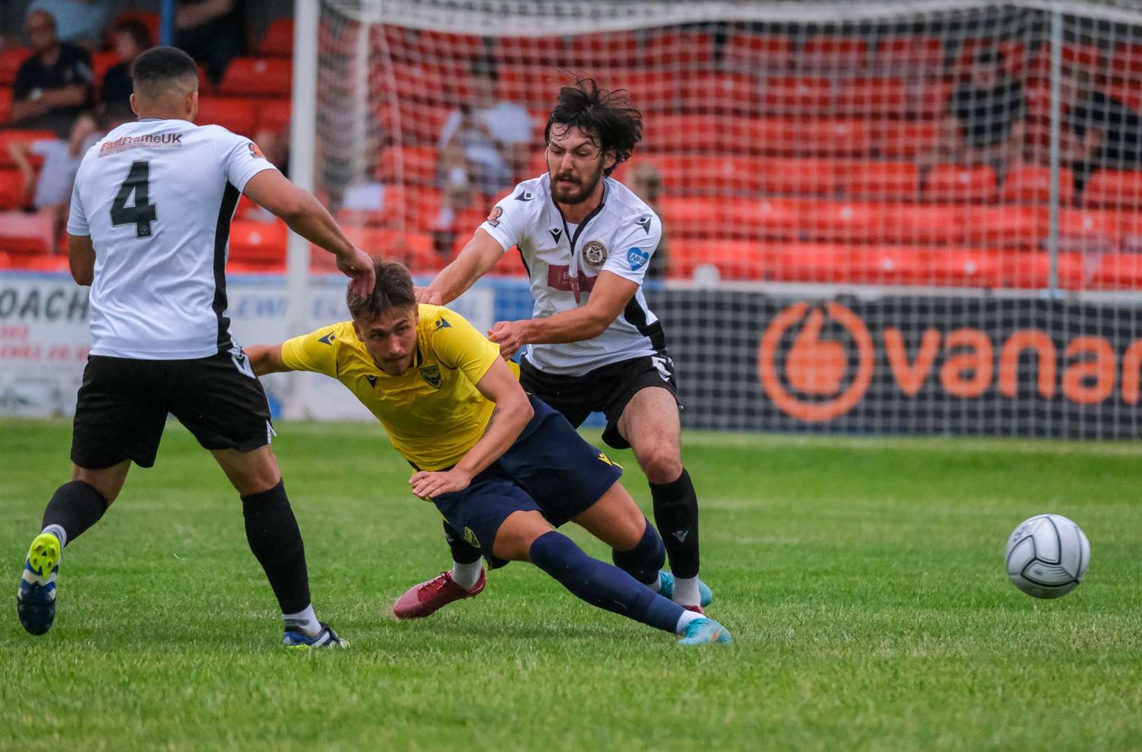 Berry-Hargreaves steams into a challenge against former club Oxford United