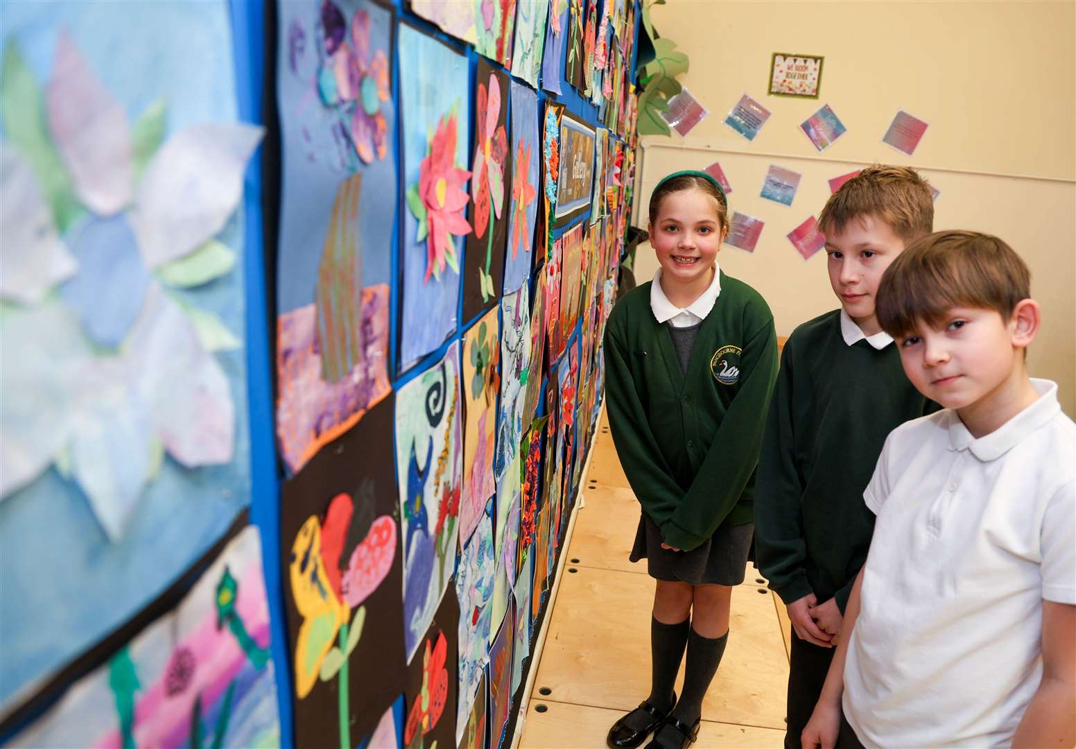 Pupils showing off their fantastic artwork