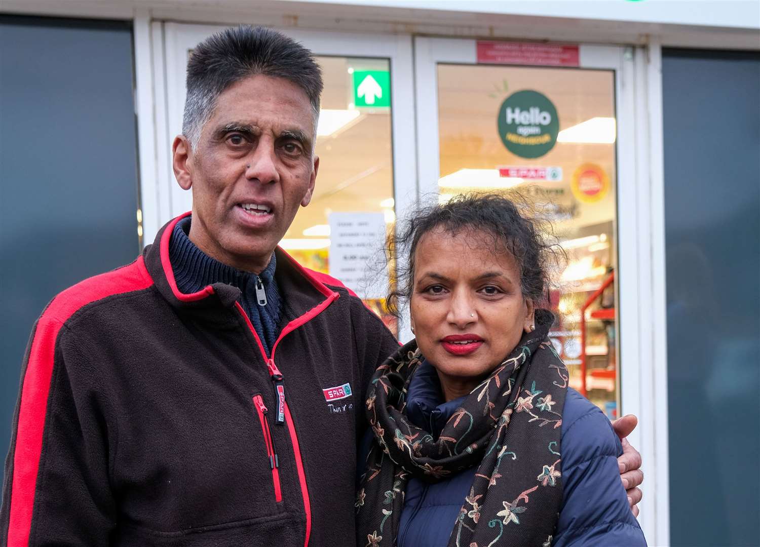 Hasmukh and ­Chandrika Shingadia outside their village store and former post office in Upper Bucklebury