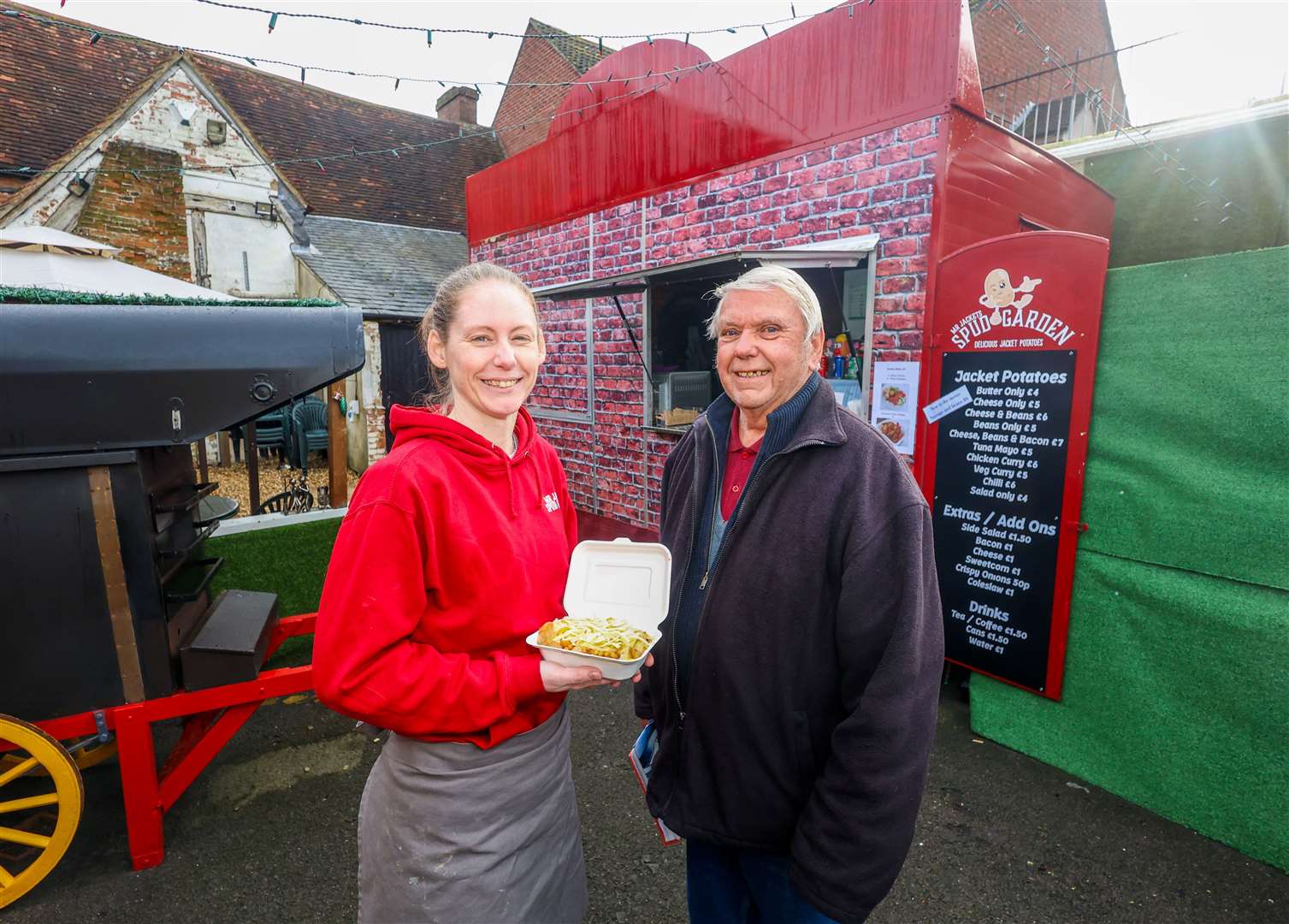 New owner Colette Myers with Alan Hall, who originally started Mr Jackets