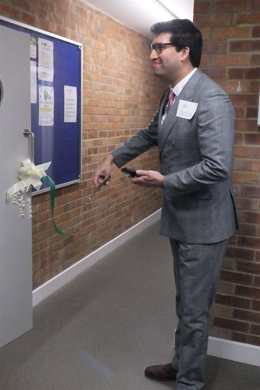 North East Hampshire MP Ranil Jayawardena cutting the ribbon