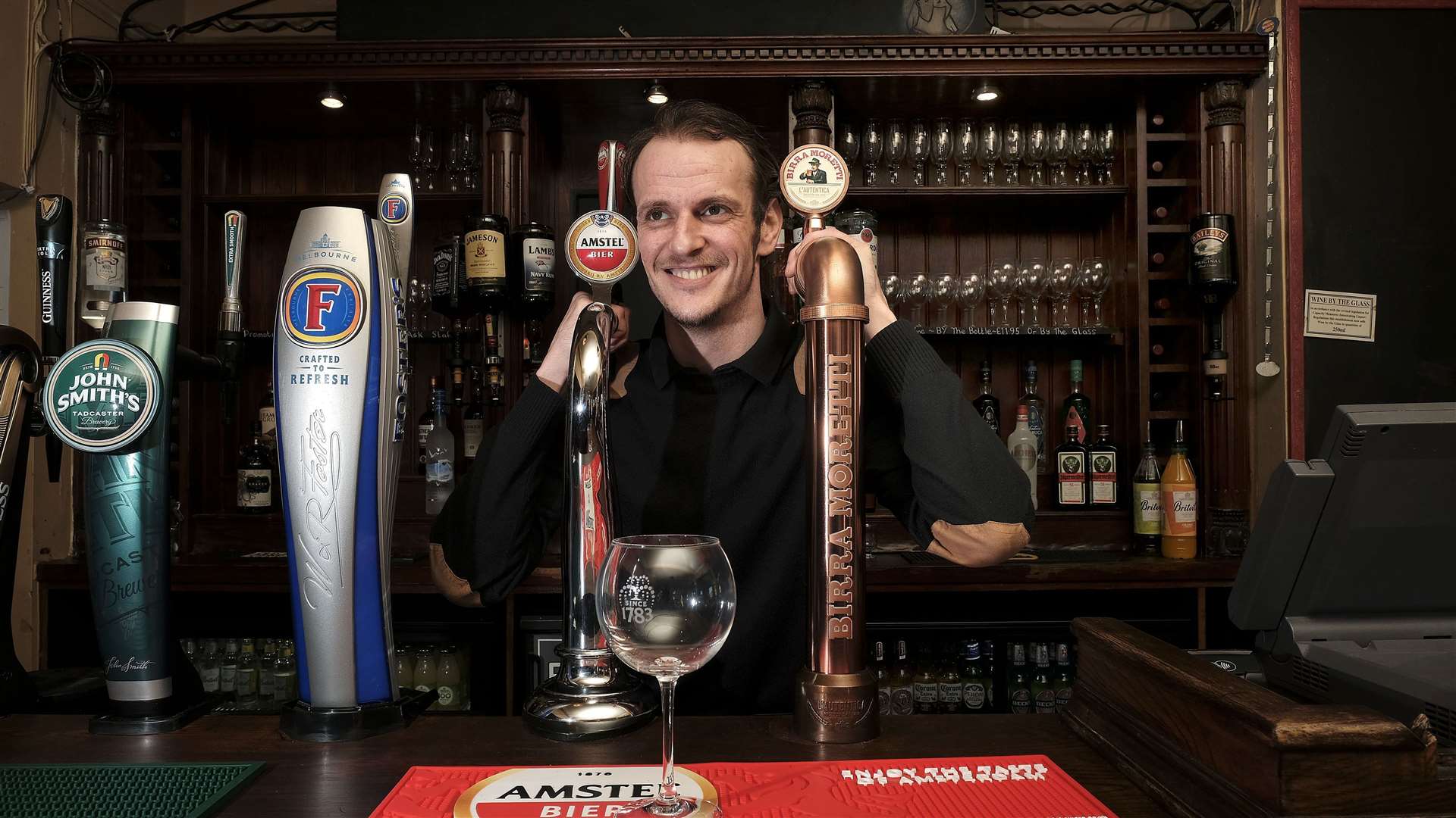 WELCOME BACK... Pubs and hugs are back – but caution is advised
