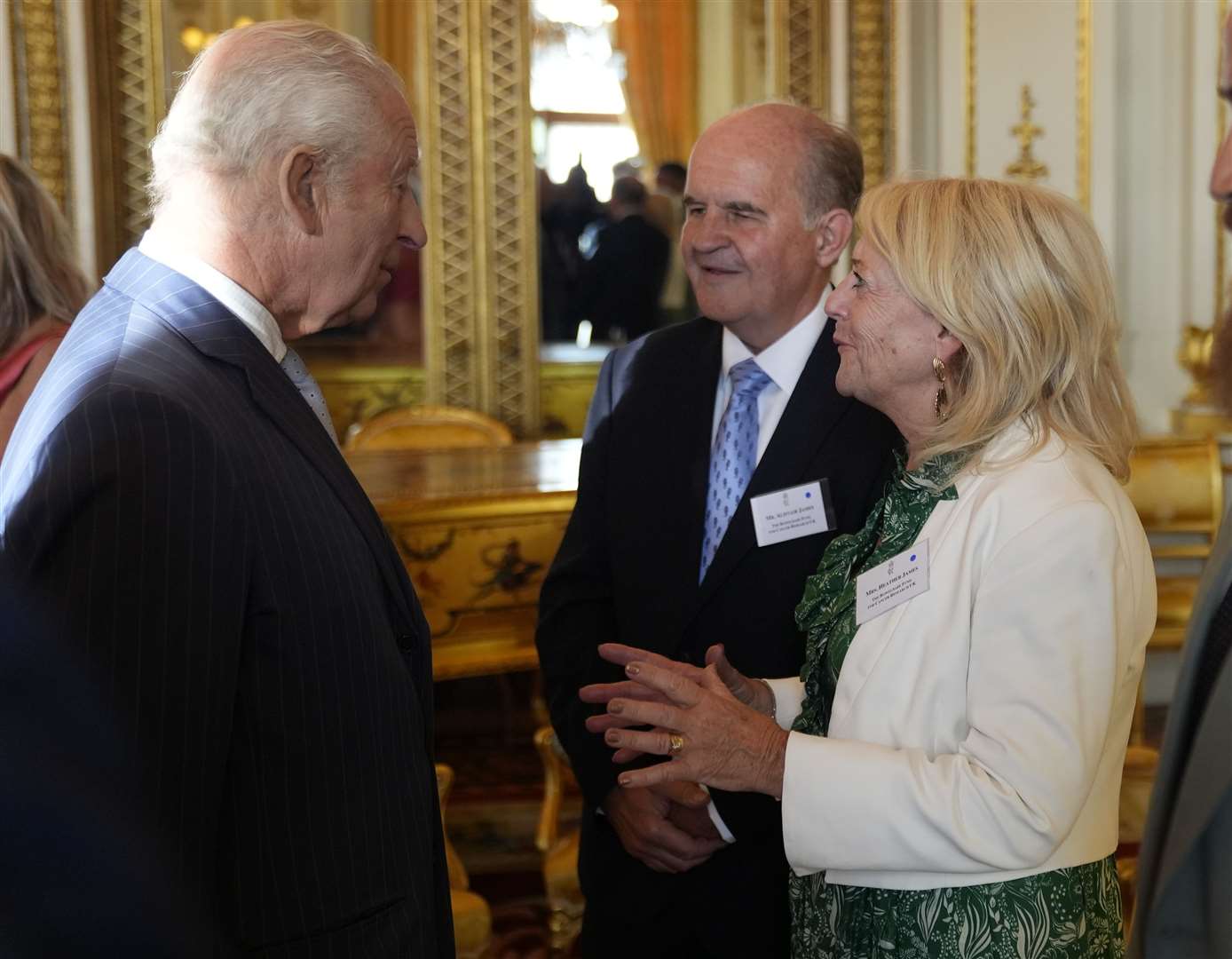 Charles with Alistair and Heather James, the parents of the late Deborah James (Andrew Matthews/PA)