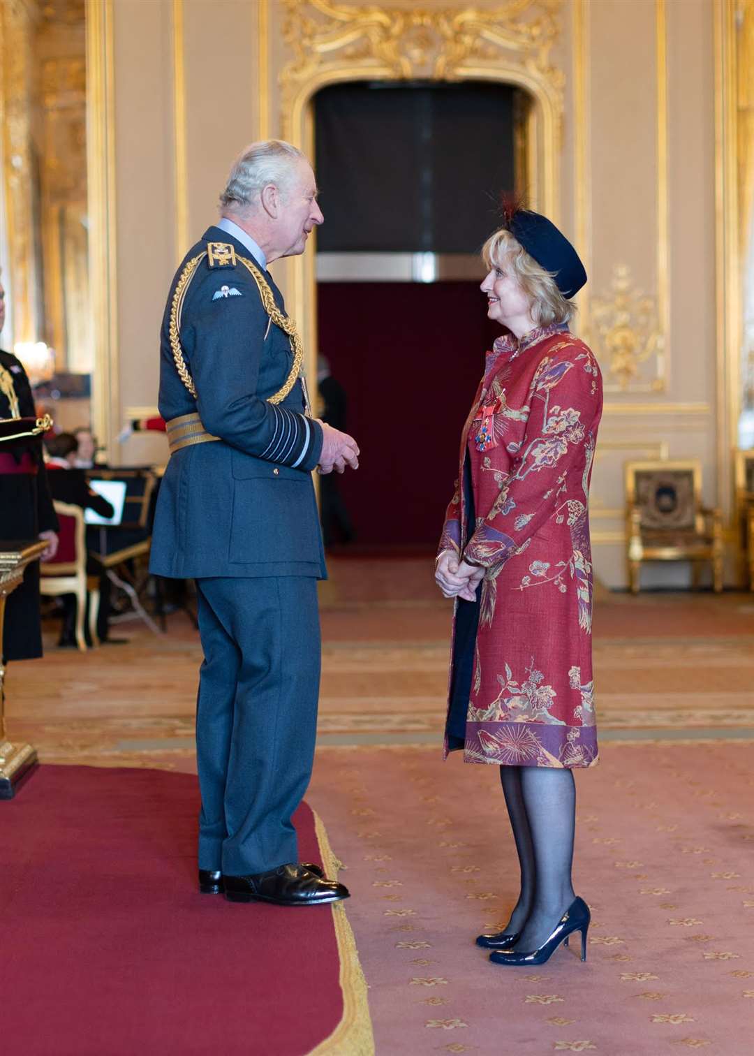 Frances Wadsworth is presented with her CBE by King Charles III