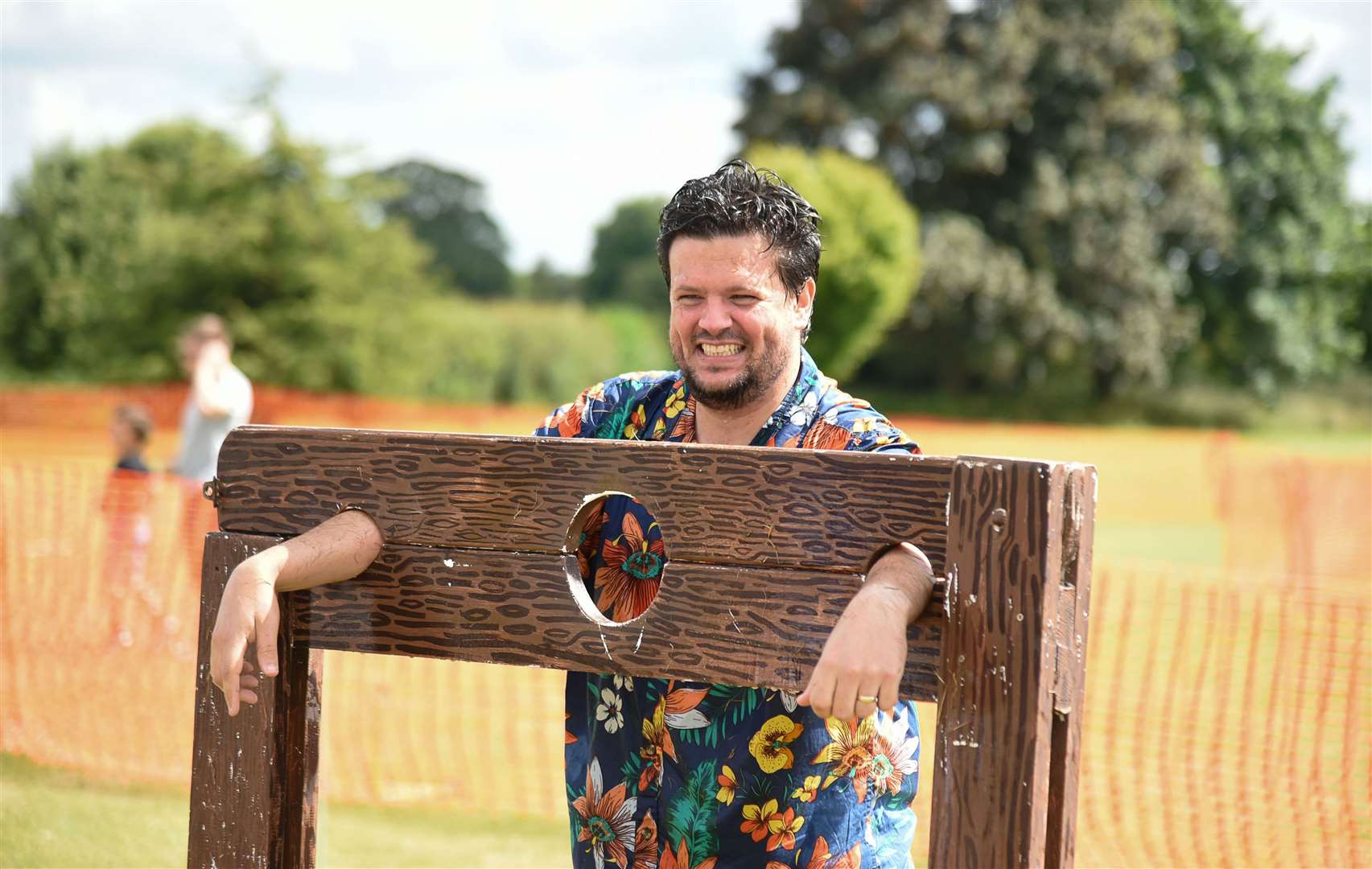 Angus Marriott, former head of Chieveley Primary School, in the stocks. Credit: Julia Hoaen