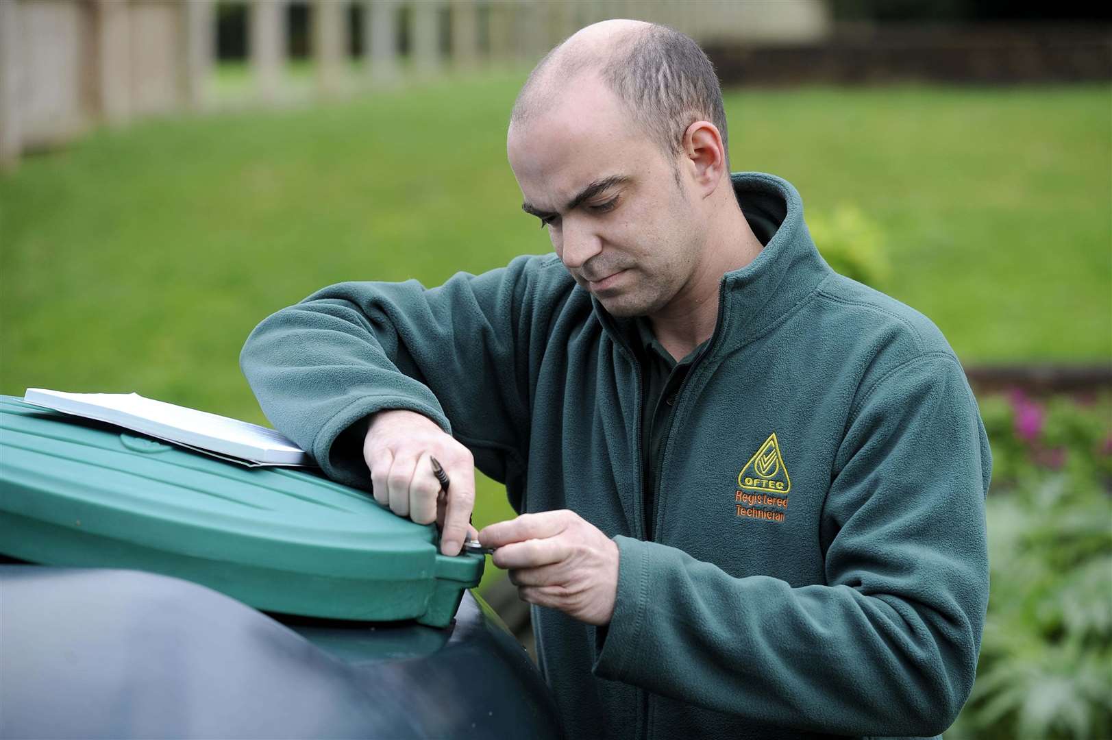 An oil tank inspection carried out by an OFTEC registered heating technician