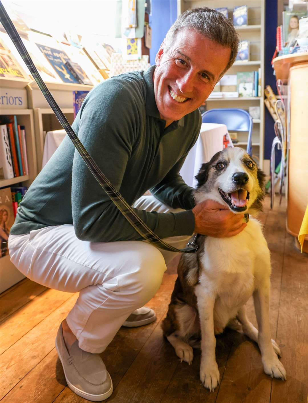 Anton Du Beke meeting a visitor’s pet, Anton Du Bark, at his recent book signing event at Hungerford Bookshop