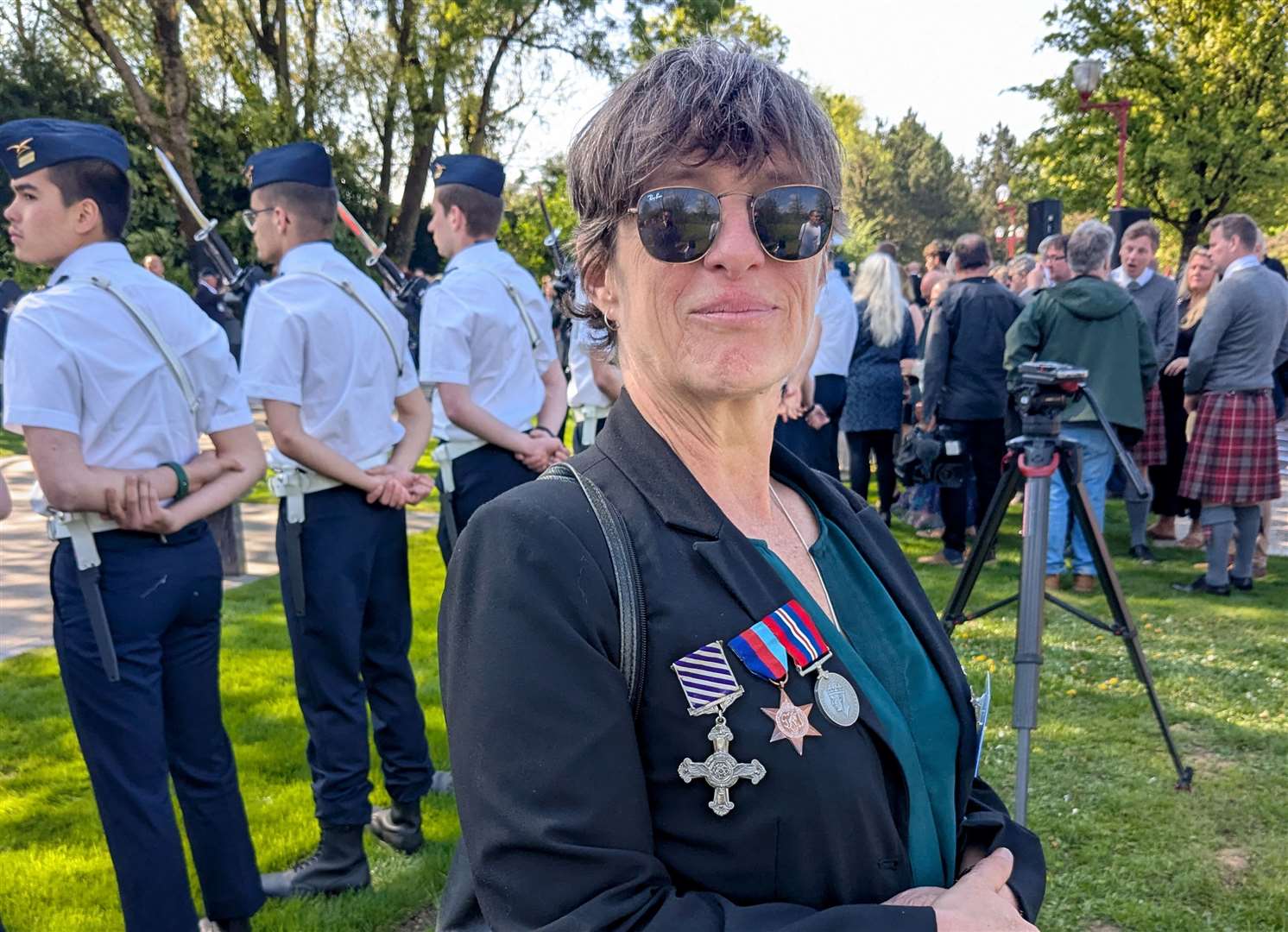 Emma Carter wearing her grandfather's medals, awarded posthumously, at the official opening of the memorial