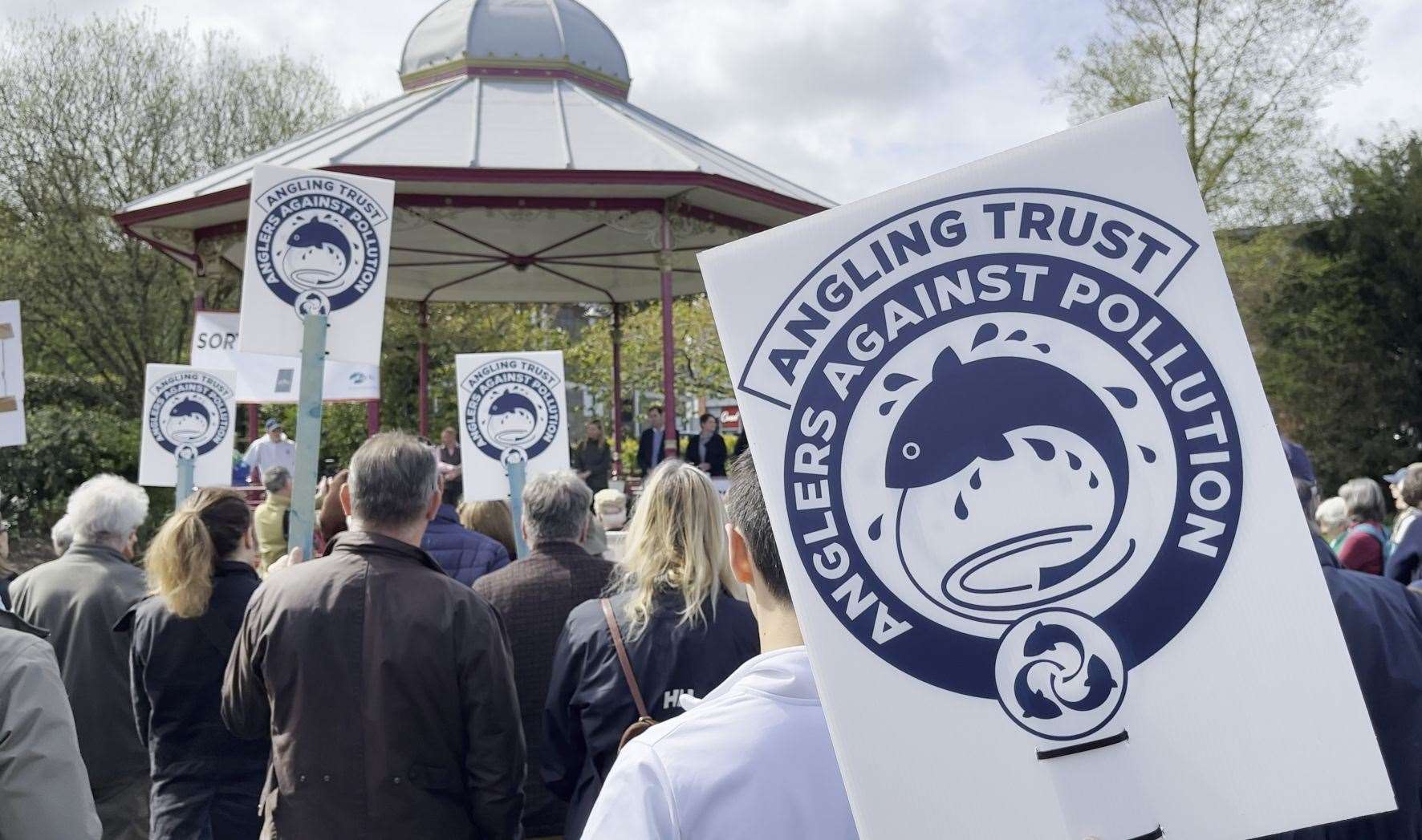 Protestors listening to speeches at the Bandstand