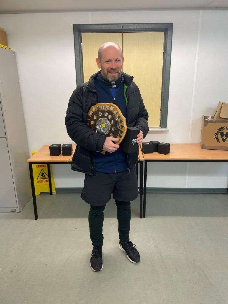 Men's Division One champion Mitch Poustie