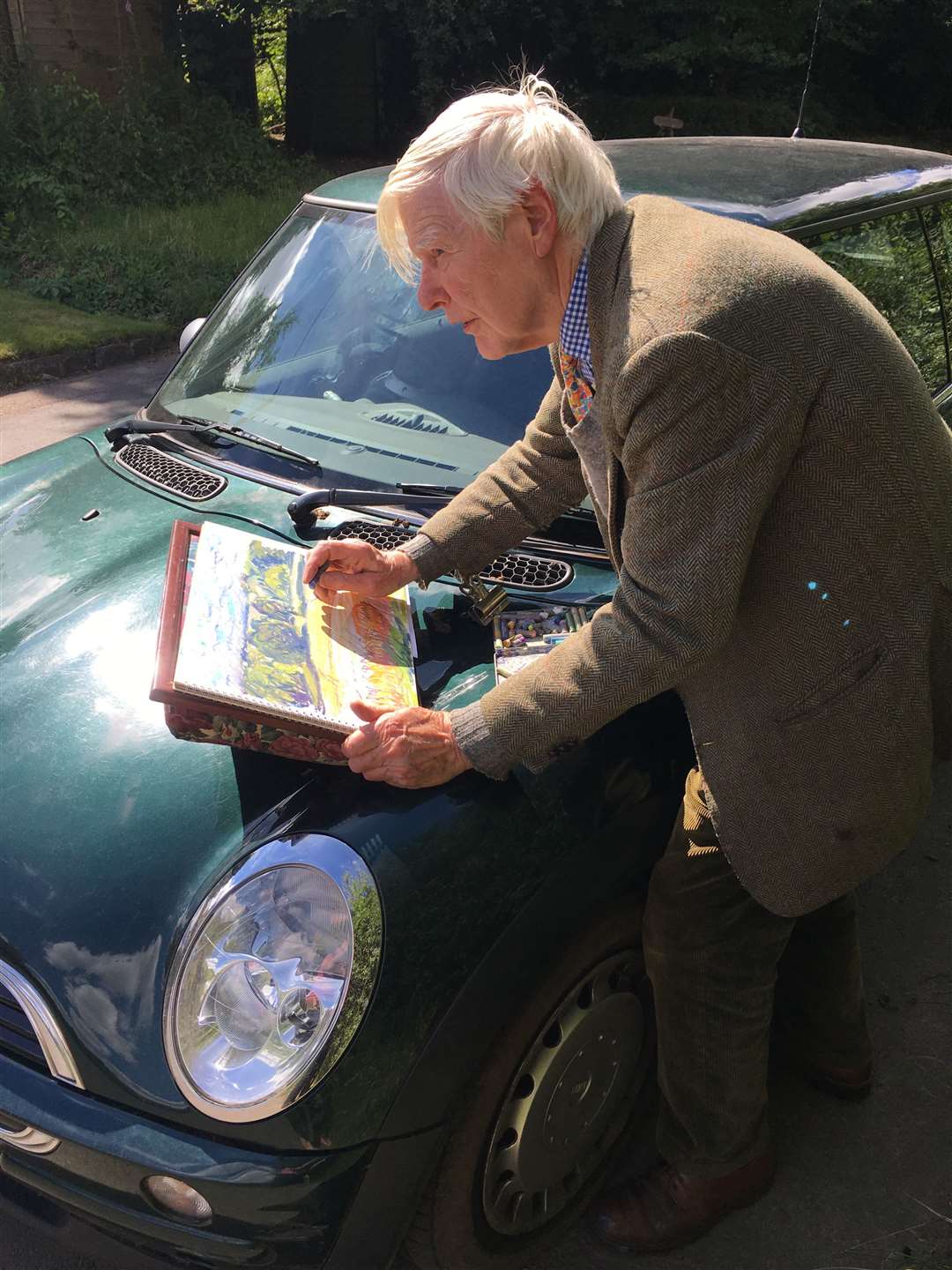 Nick Schlee sketching outdoors