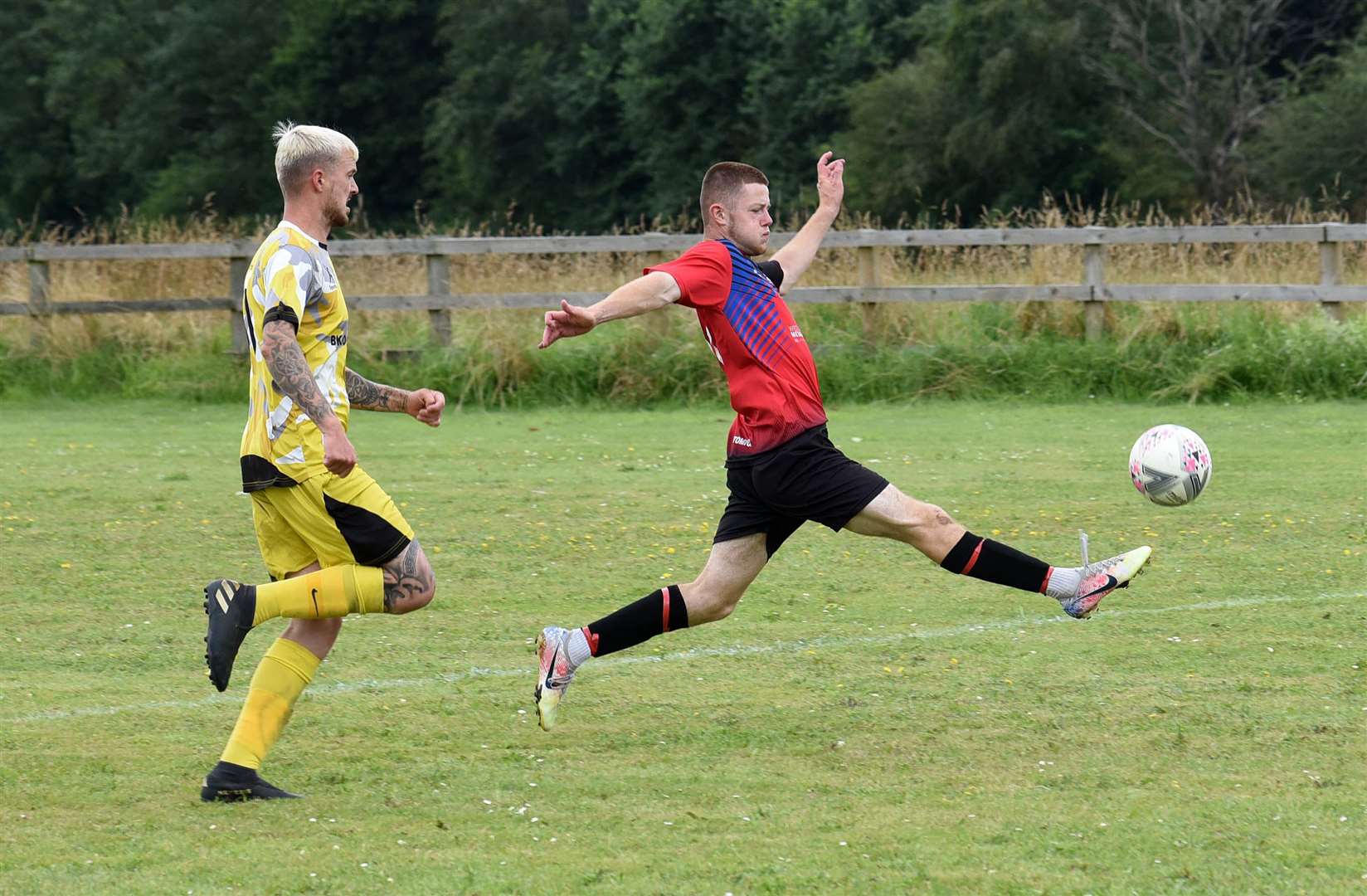 An AFC Aldermaston attempts to reach for the ball