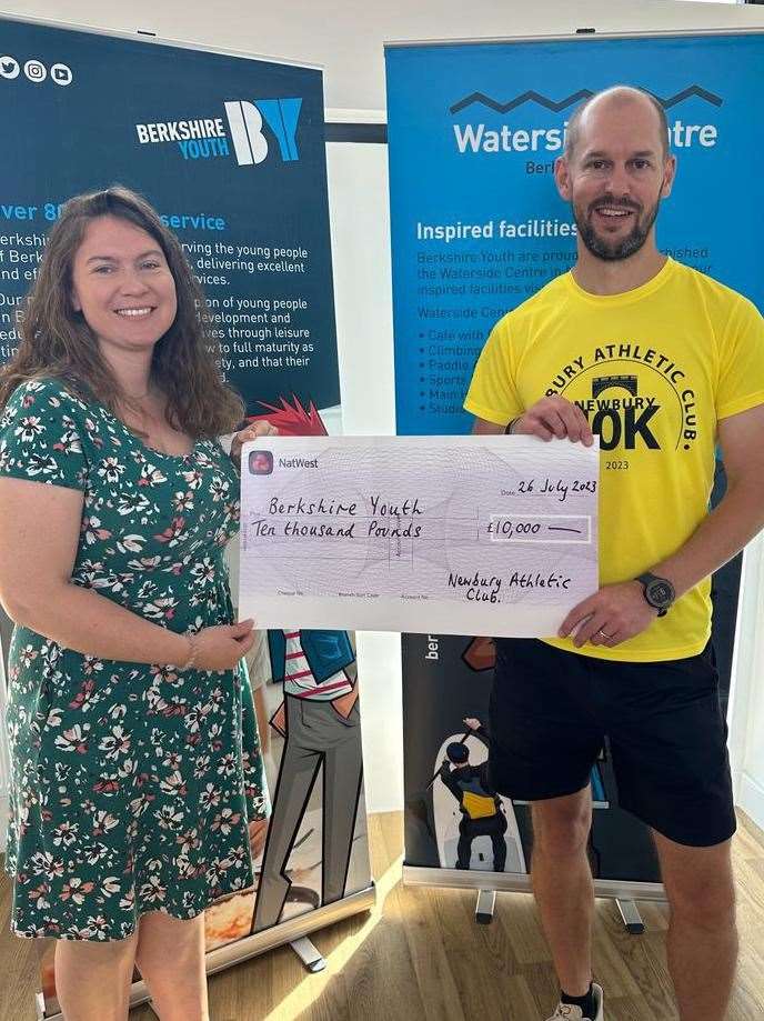 Treasurer from Newbury Athletic Club Jeff Bird with Berkshire Youth CEO, Sarah Emery, picture: Berkshire Youth
