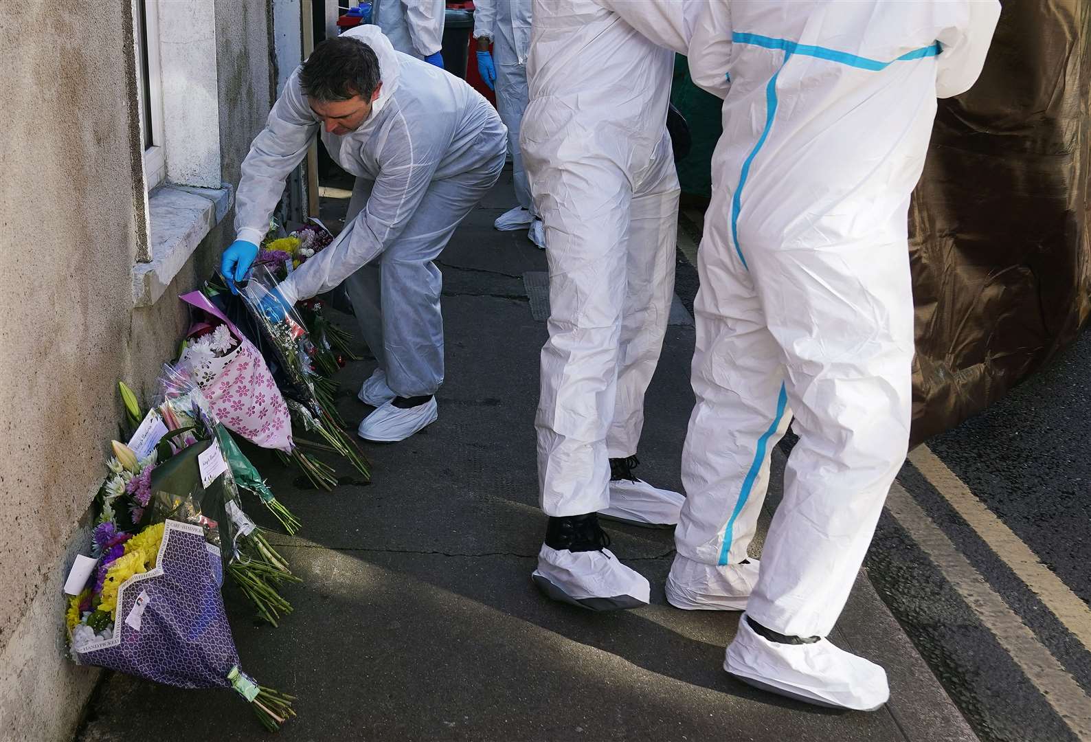 Members of the Garda forensics at the scene in Youghal, Co Cork, close to where Tina Satchwell’s remains were discovered (Brian Lawless/PA)