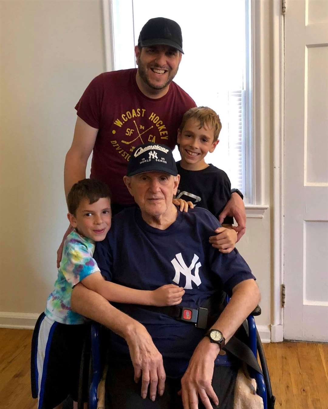 George Tiss with his son Brian and grandsons Andy, seven (left) and Jack, nine, in July 2017