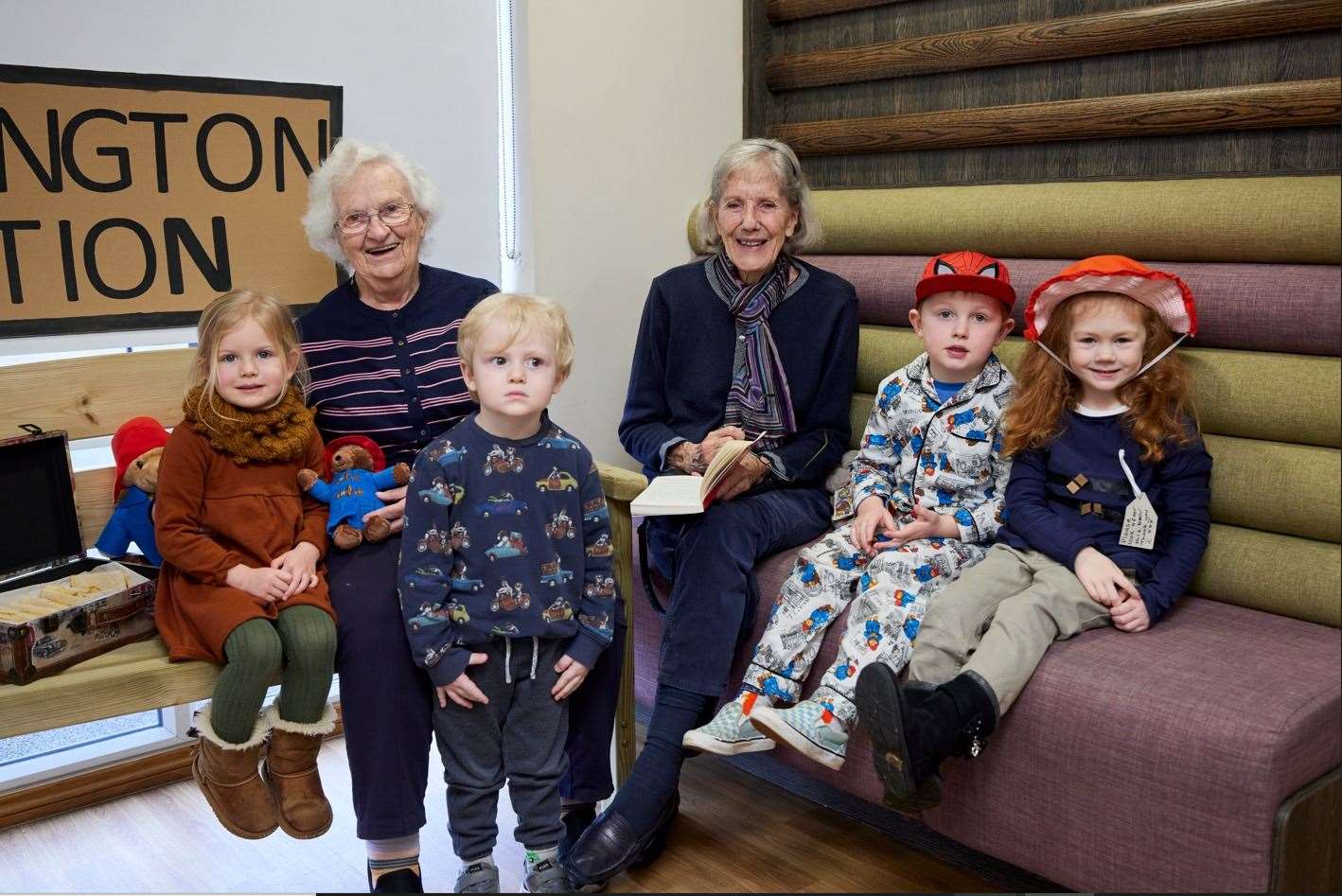 Alma Deaking and Helga Patrikios posing with the children