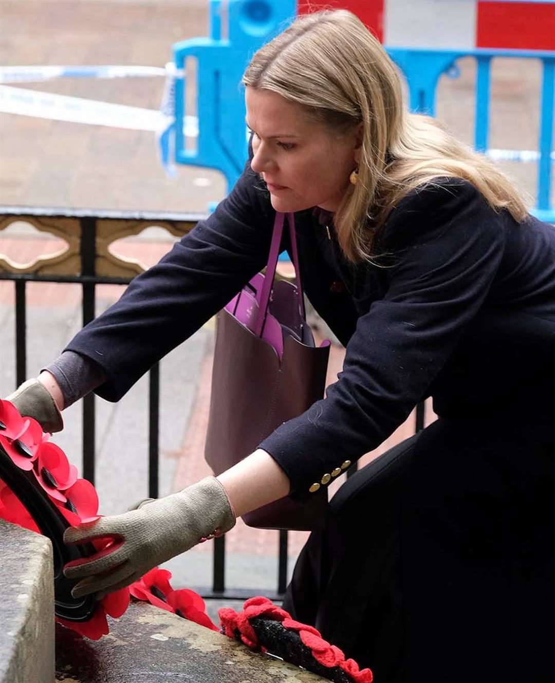 Newbury MP Laura Farris laying a wreath at Newbury War Memorial
