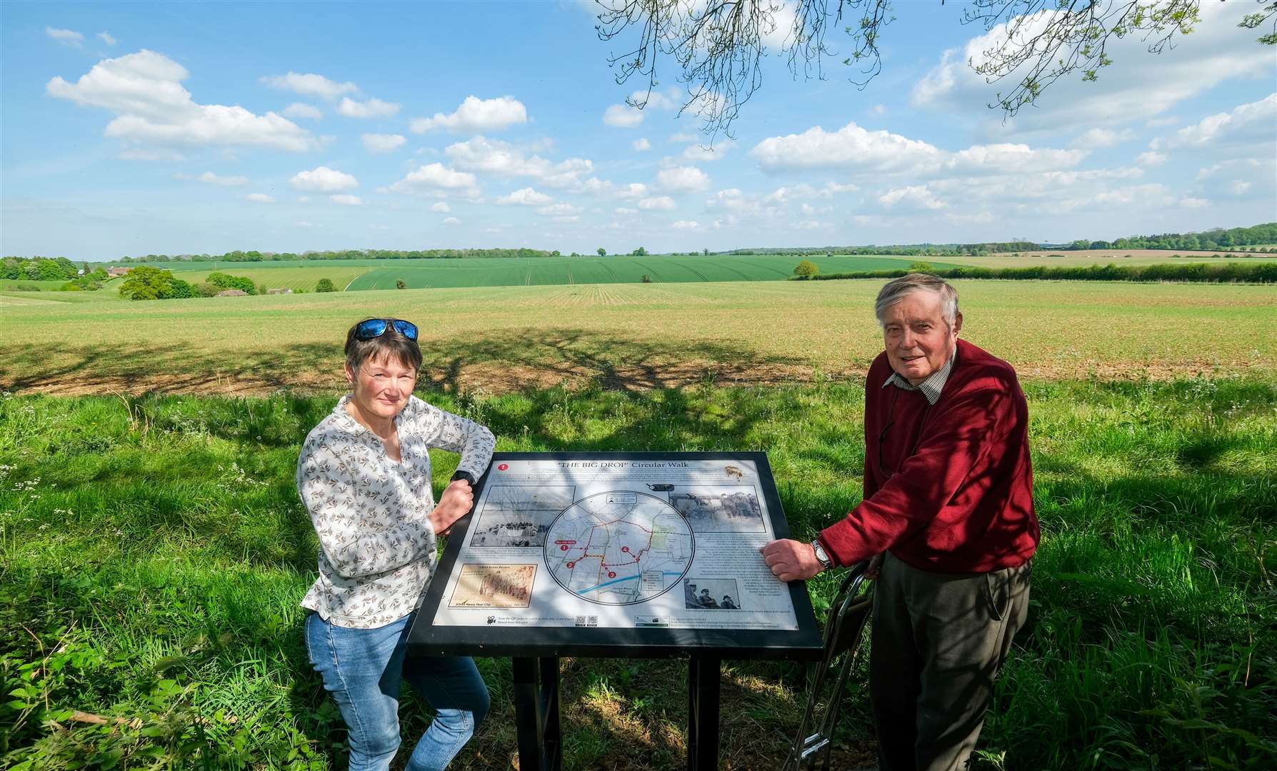 Jenny Smith and her father, Alan Baylis, standing in the field where it all happened 80 years earlier
